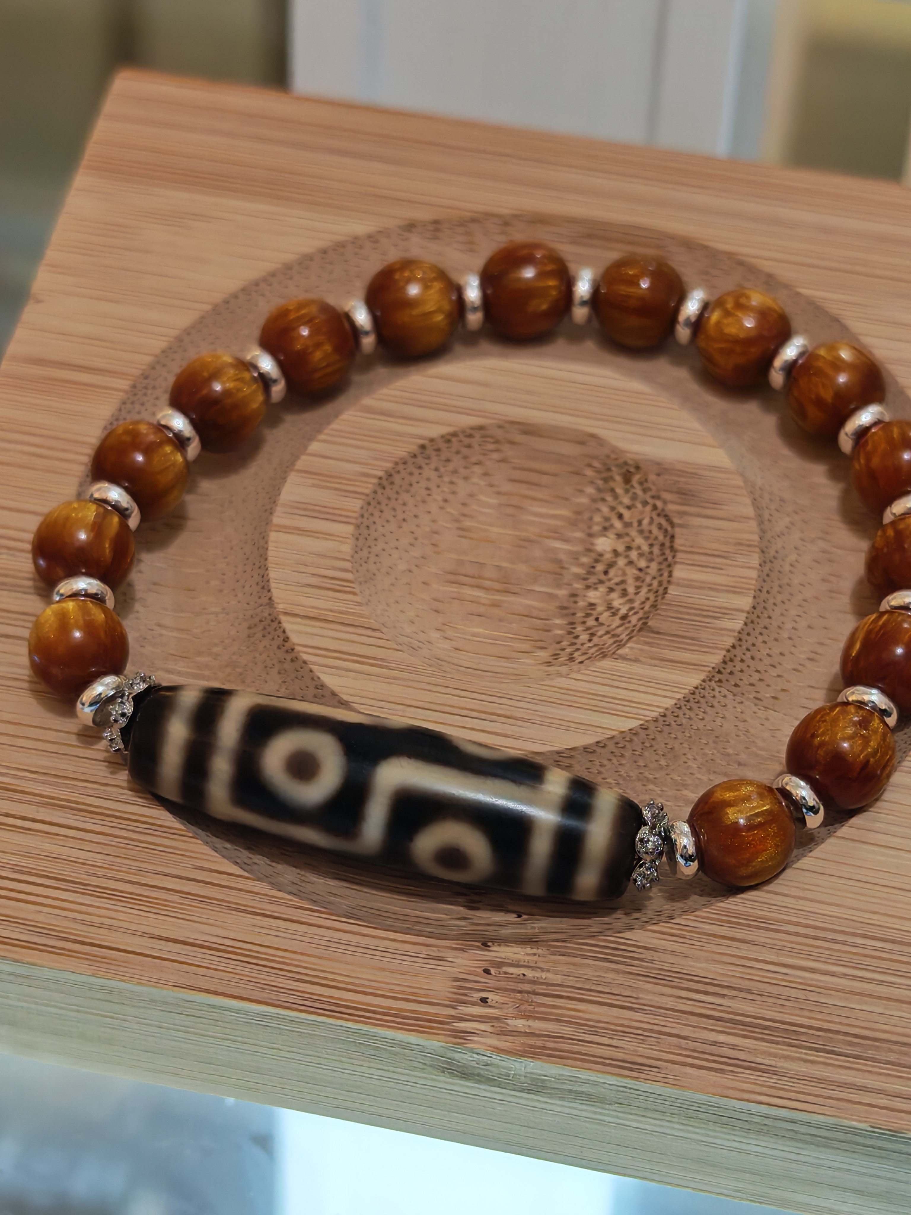 《牙黃六眼天珠》24079