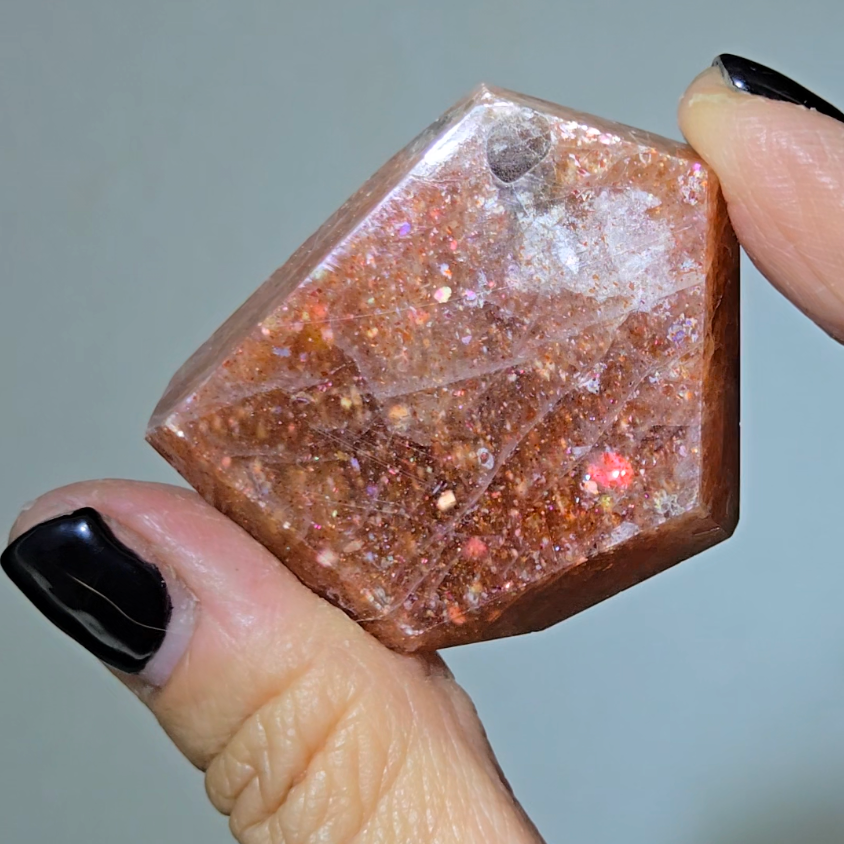 Arusha sunstone with rainbow glitter, smoky quartz inclusions - SM61