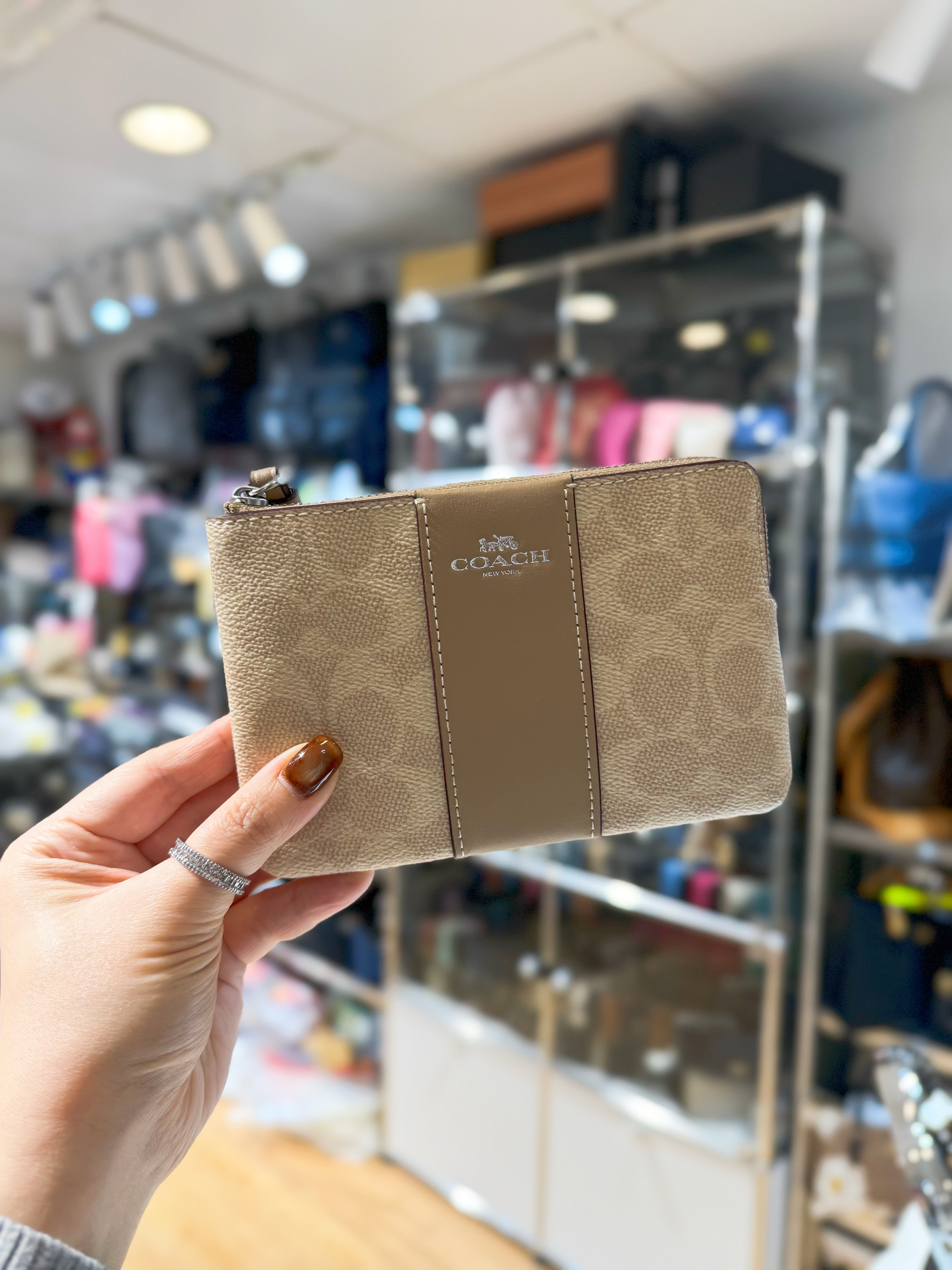 Coach wristlet  milk tea/m