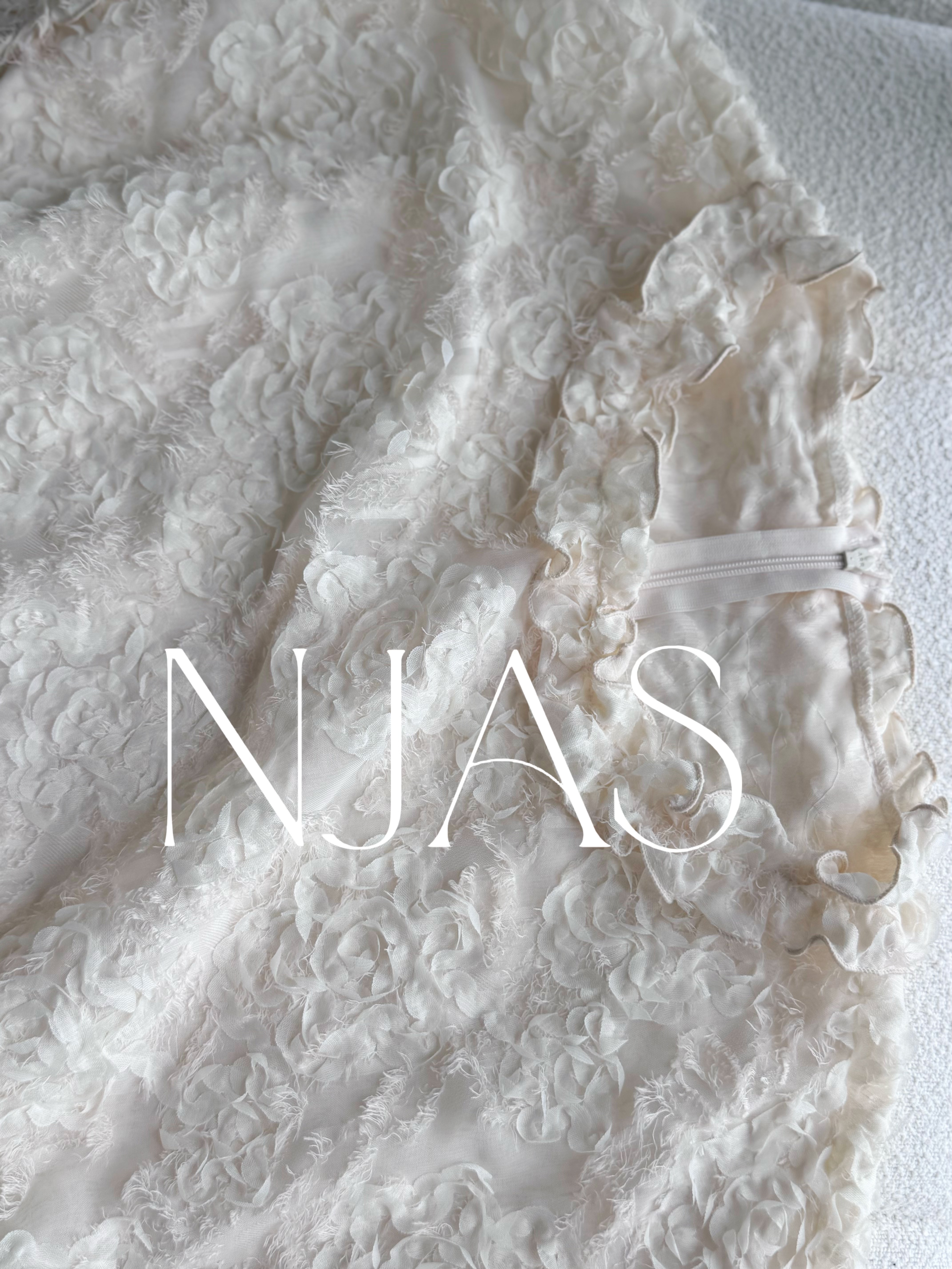 Feminine textured flower blouse