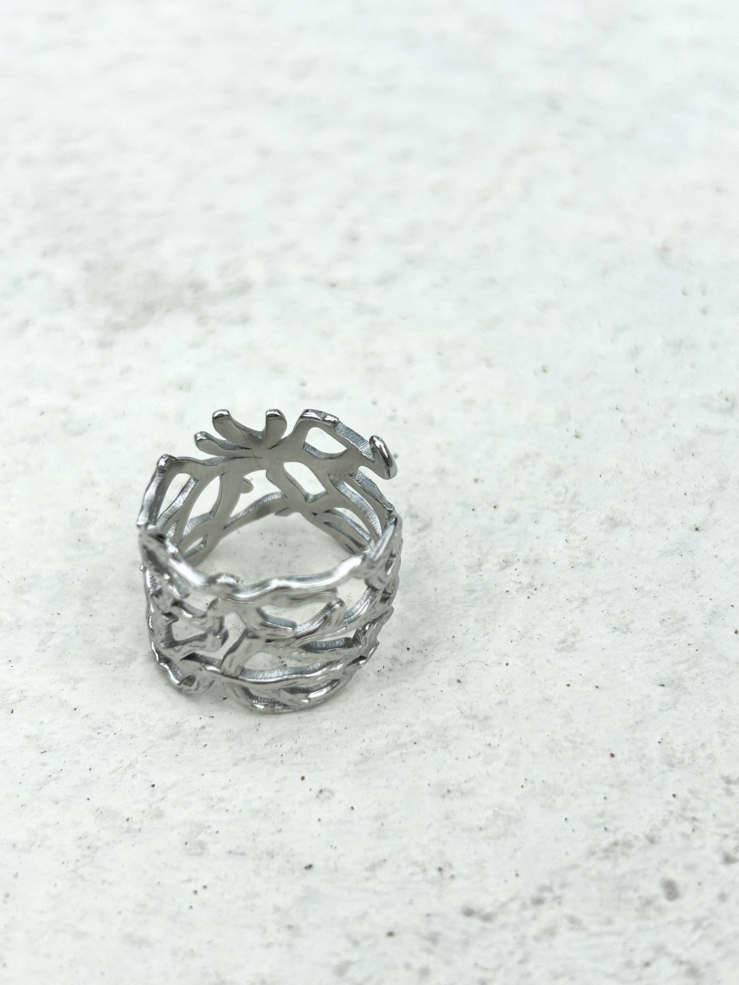 Silver branch cutout ring