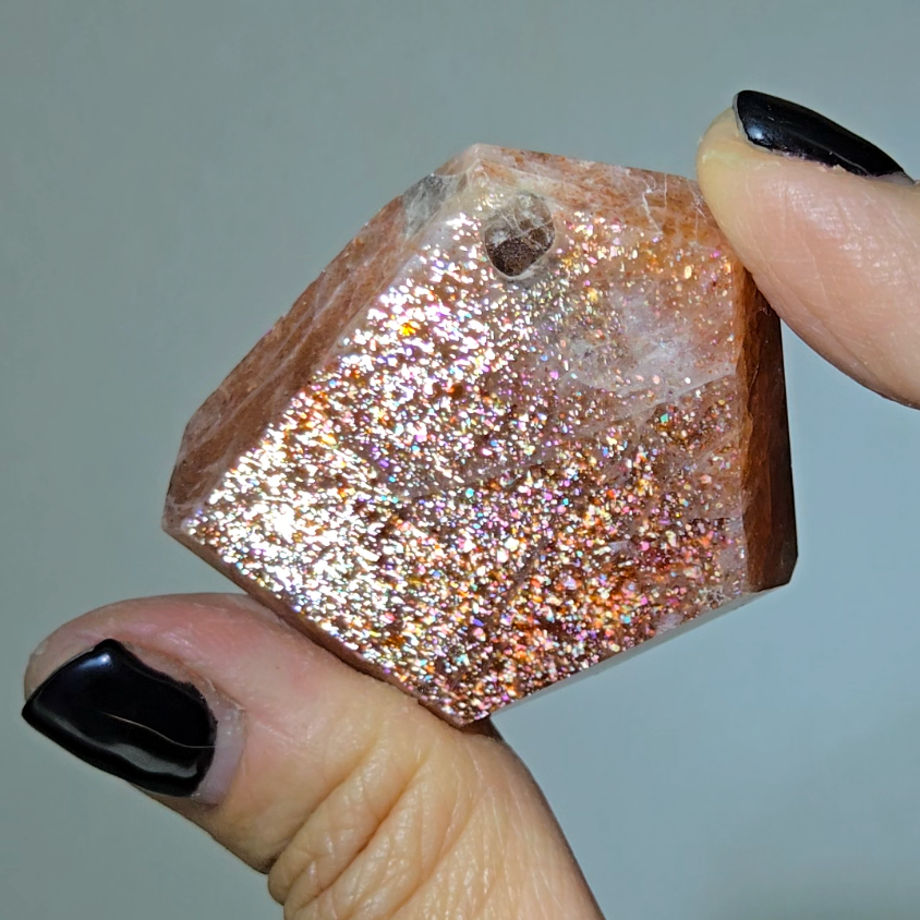 Arusha sunstone with rainbow glitter, smoky quartz inclusions - SM61