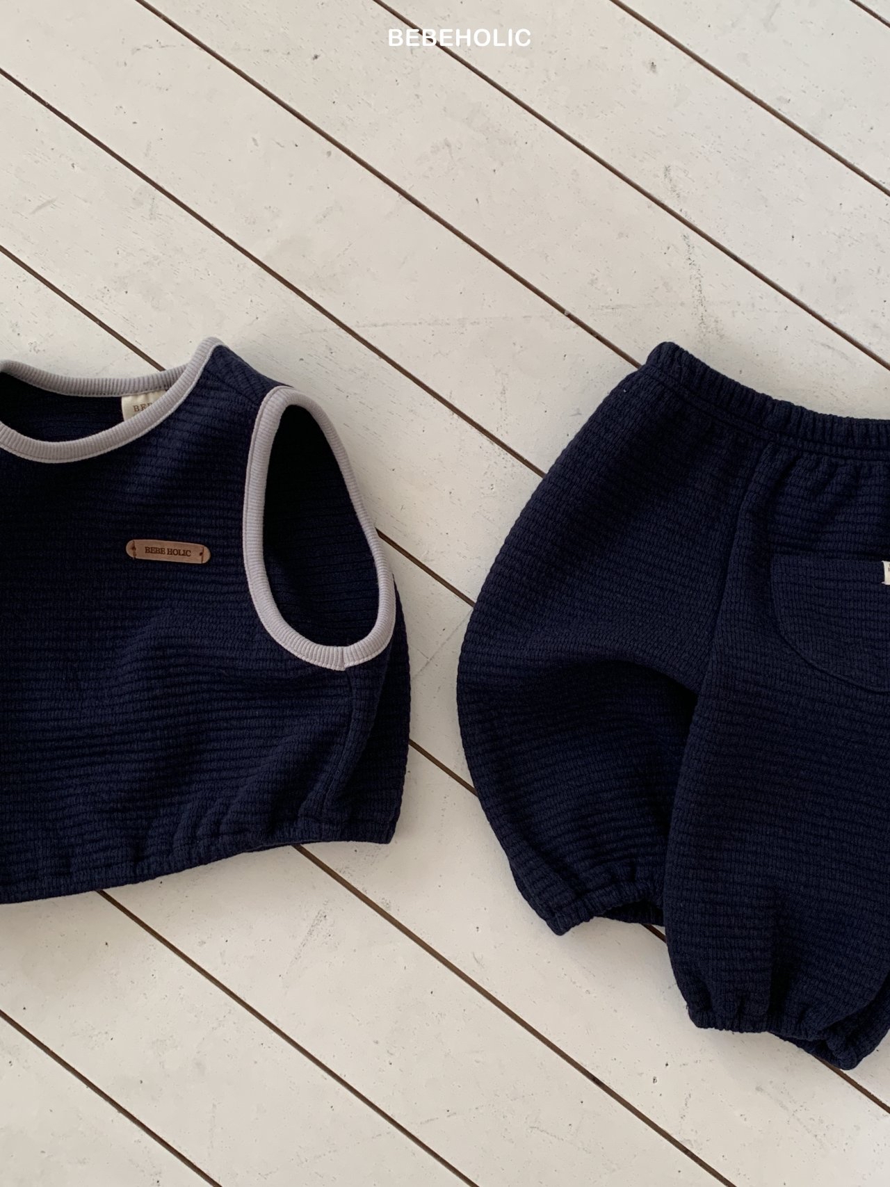 🌸預訂 韓國直送🌸🇰🇷BEBEHOLIC兩色皮革章撞色背心上下套裝