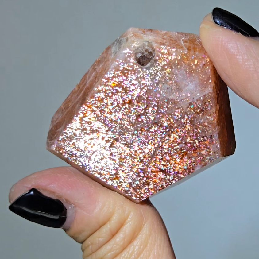 Arusha sunstone with rainbow glitter, smoky quartz inclusions - SM61