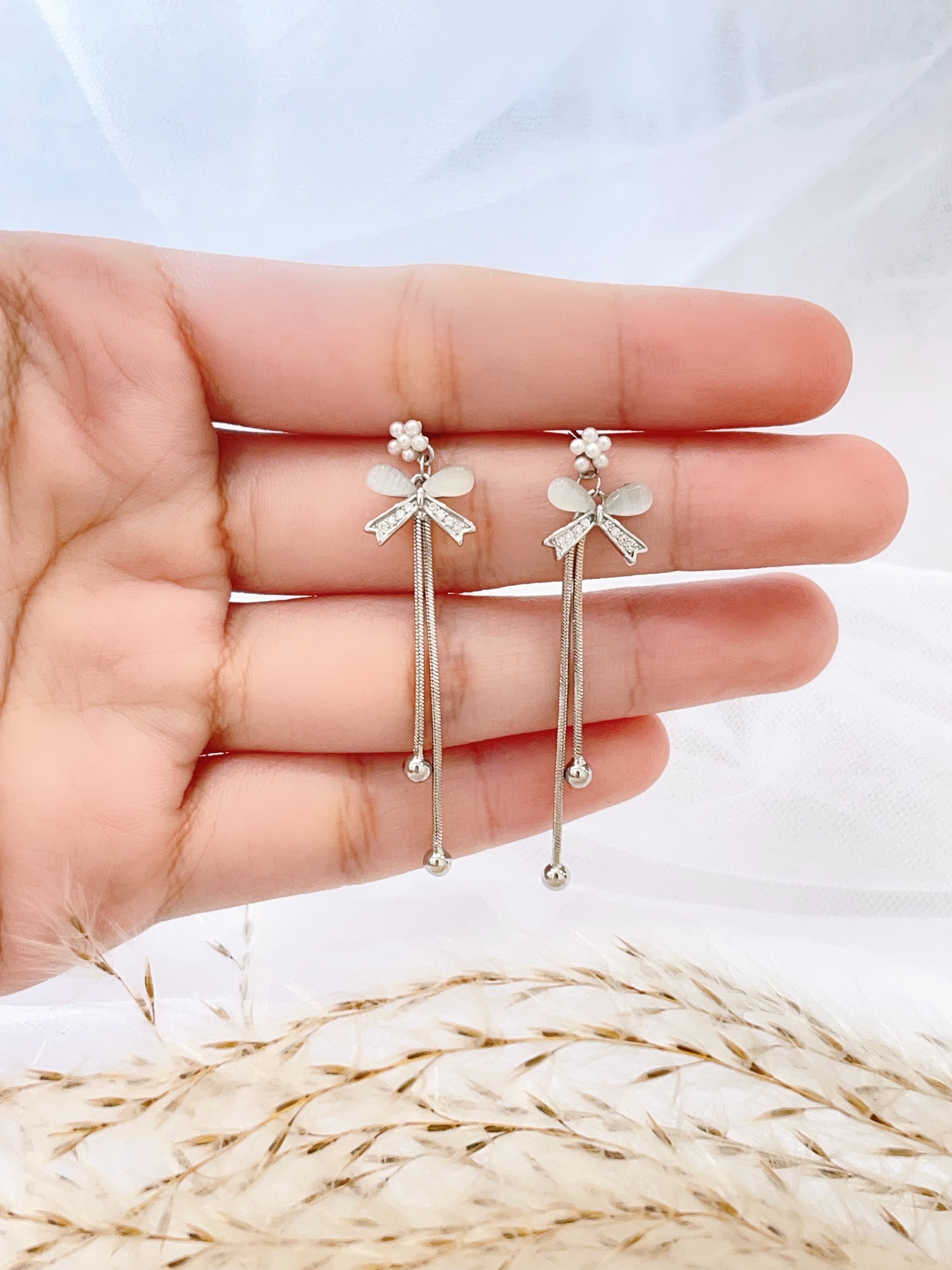 猫眼石蝴蝶结长流苏耳环