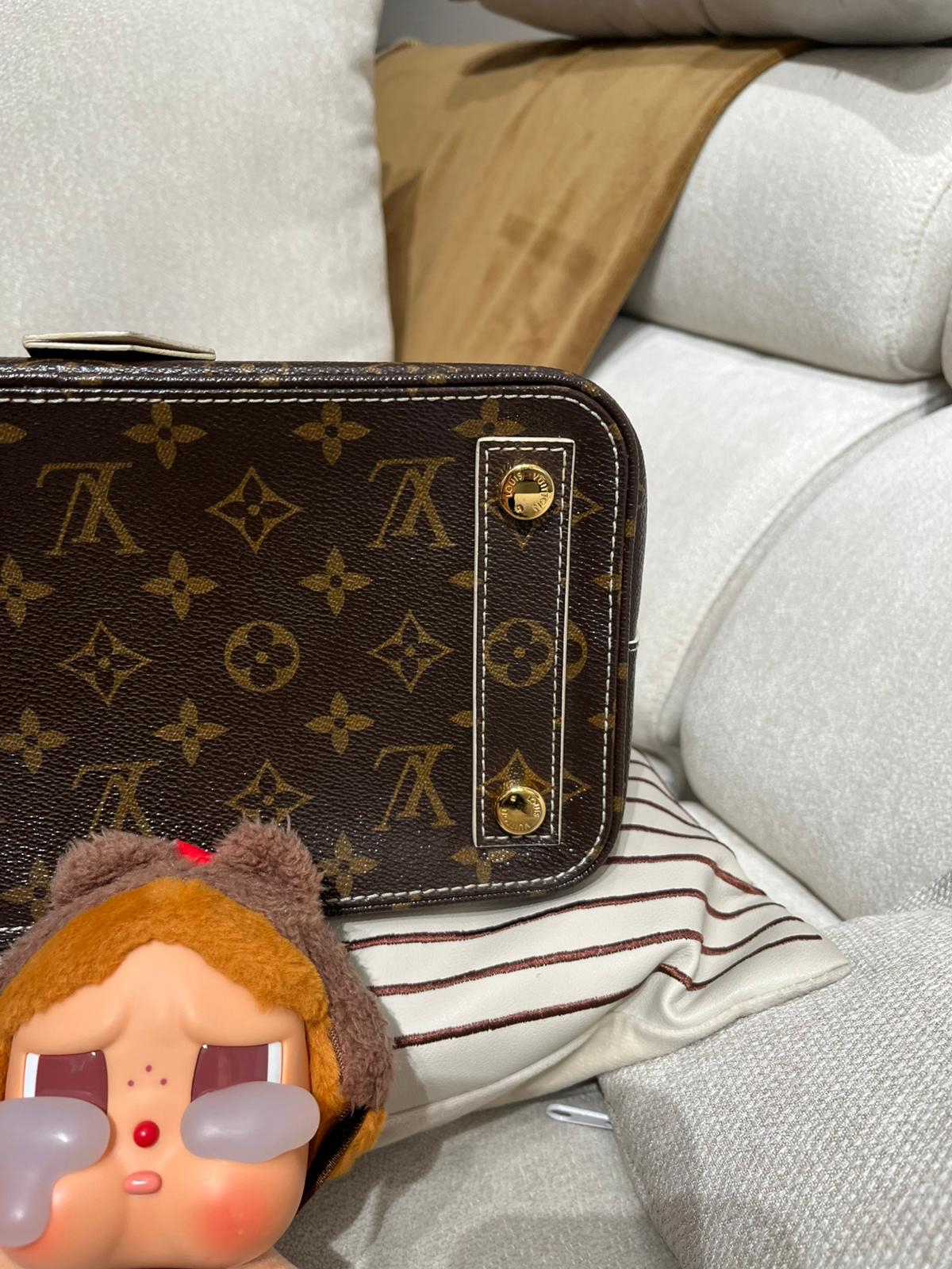 Lv lockit limited edition  100%Authentic,95%new  ✅key lock ✅dust bag 