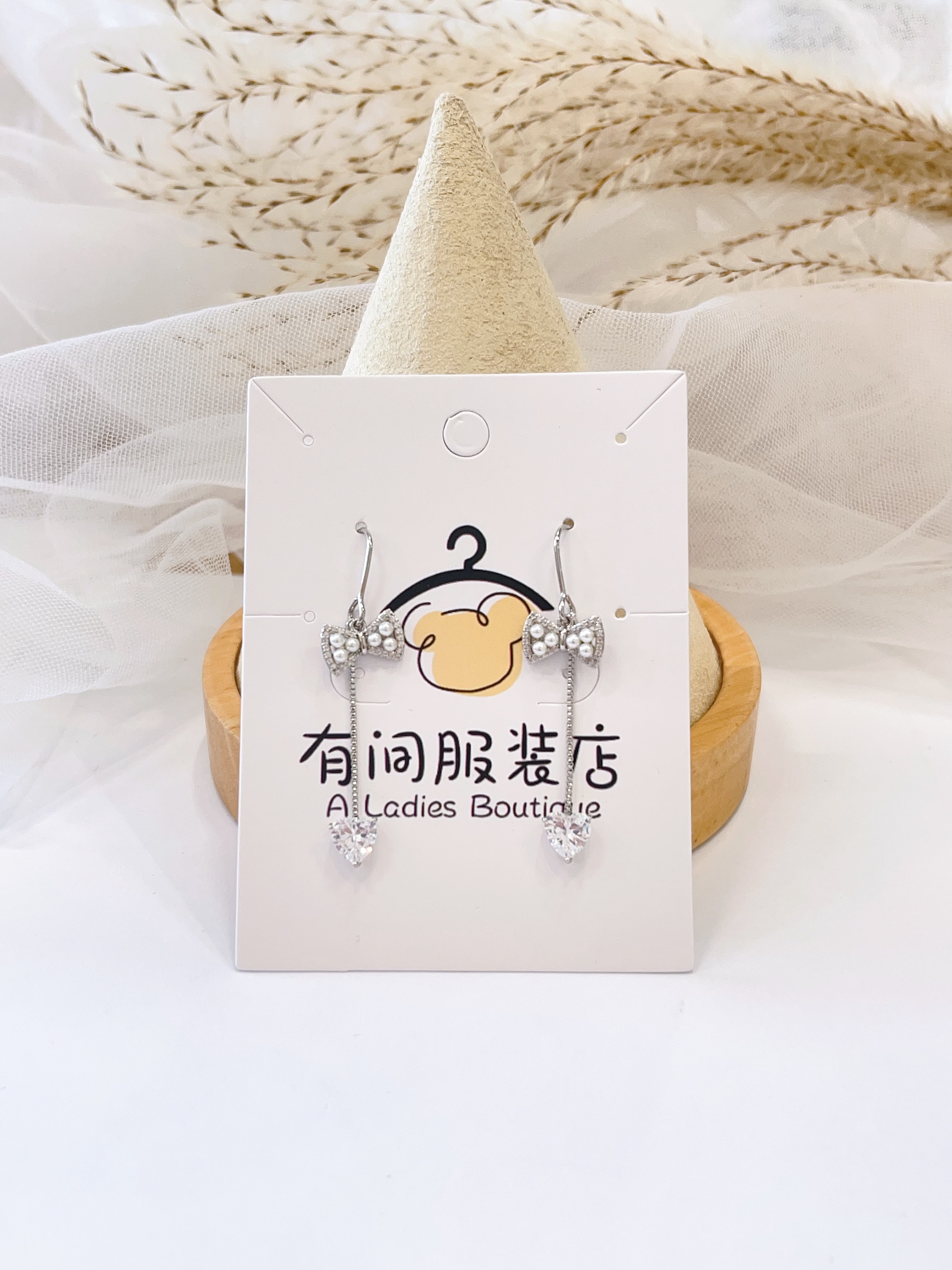 珍珠蝴蝶结爱心流苏耳环