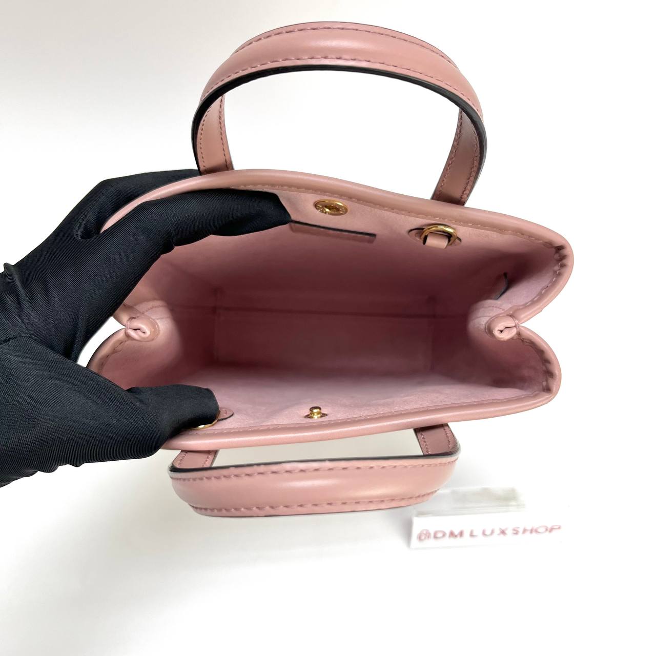 Gucci Pink GG Embossed Vertical Mini Tote