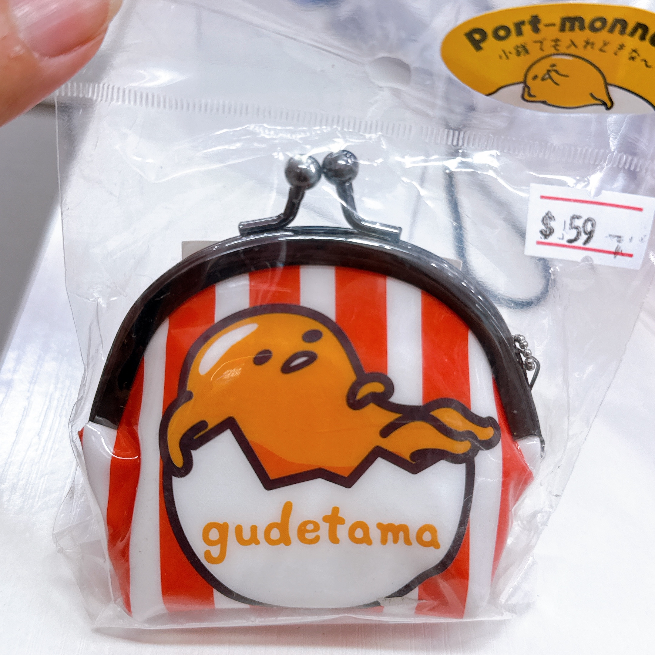 日本北海道限定蛋黃哥散銀包