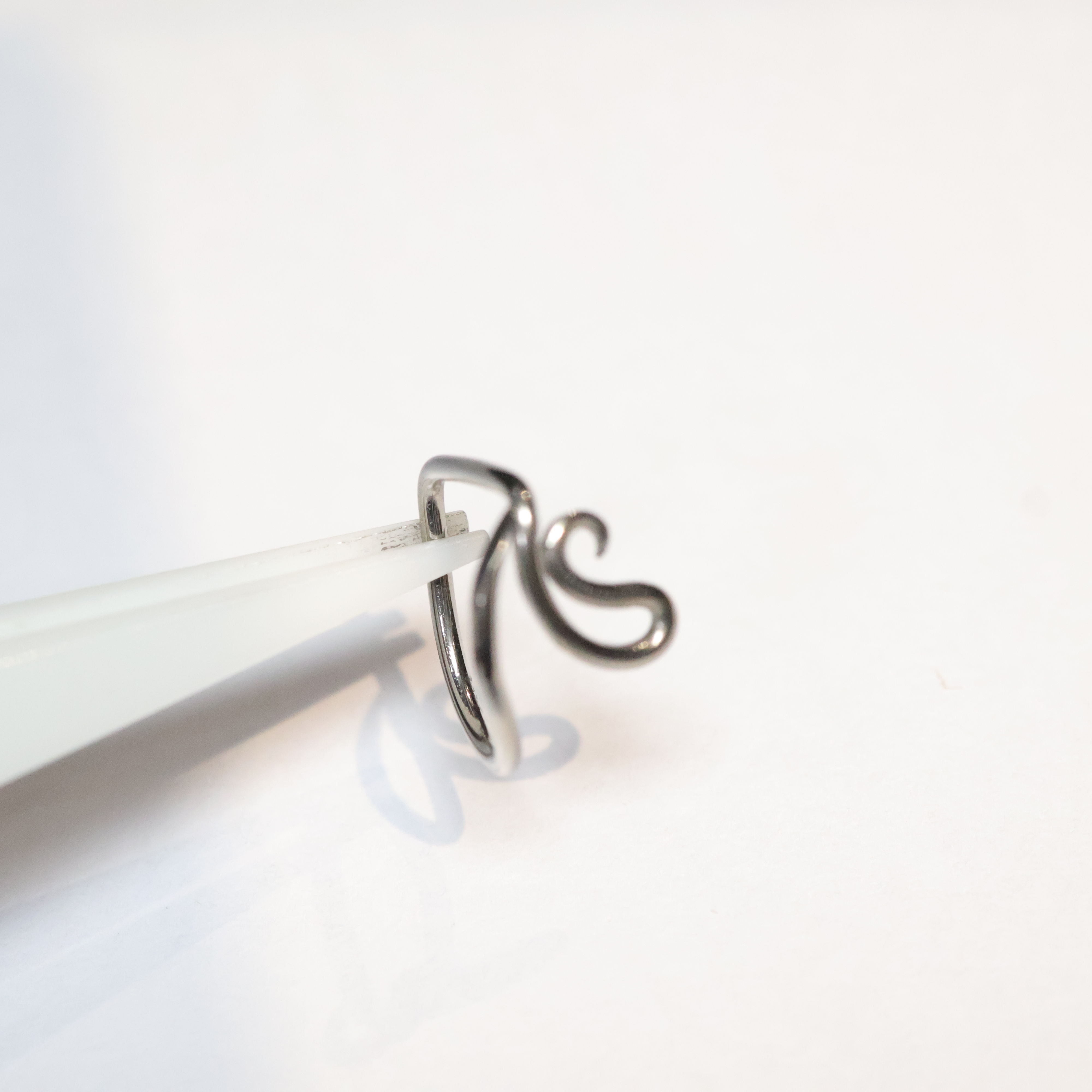 Capella	(Nostril, Tragus, & Forward Helix)