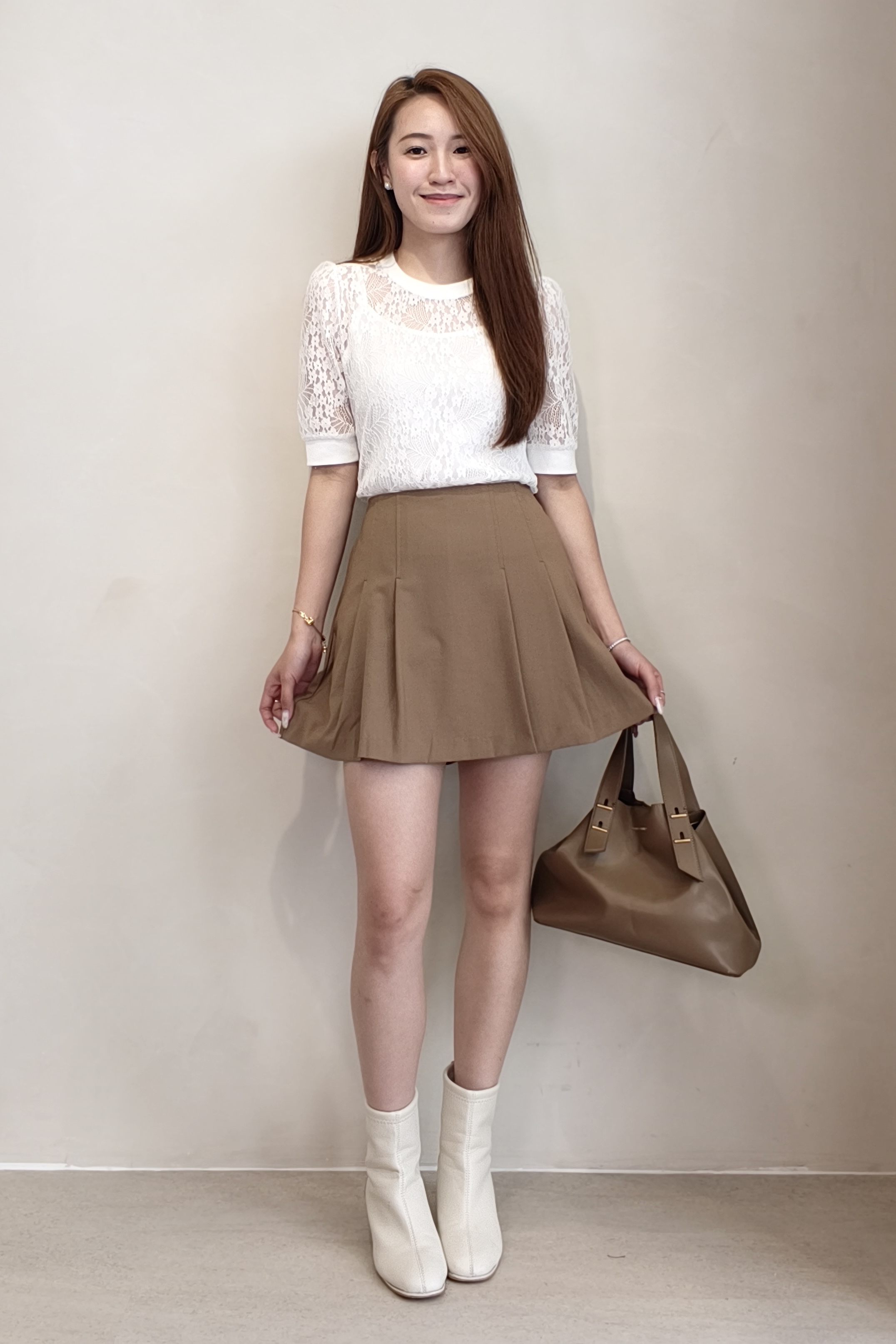580271 Avery Pleated A-Line Mini Skirt