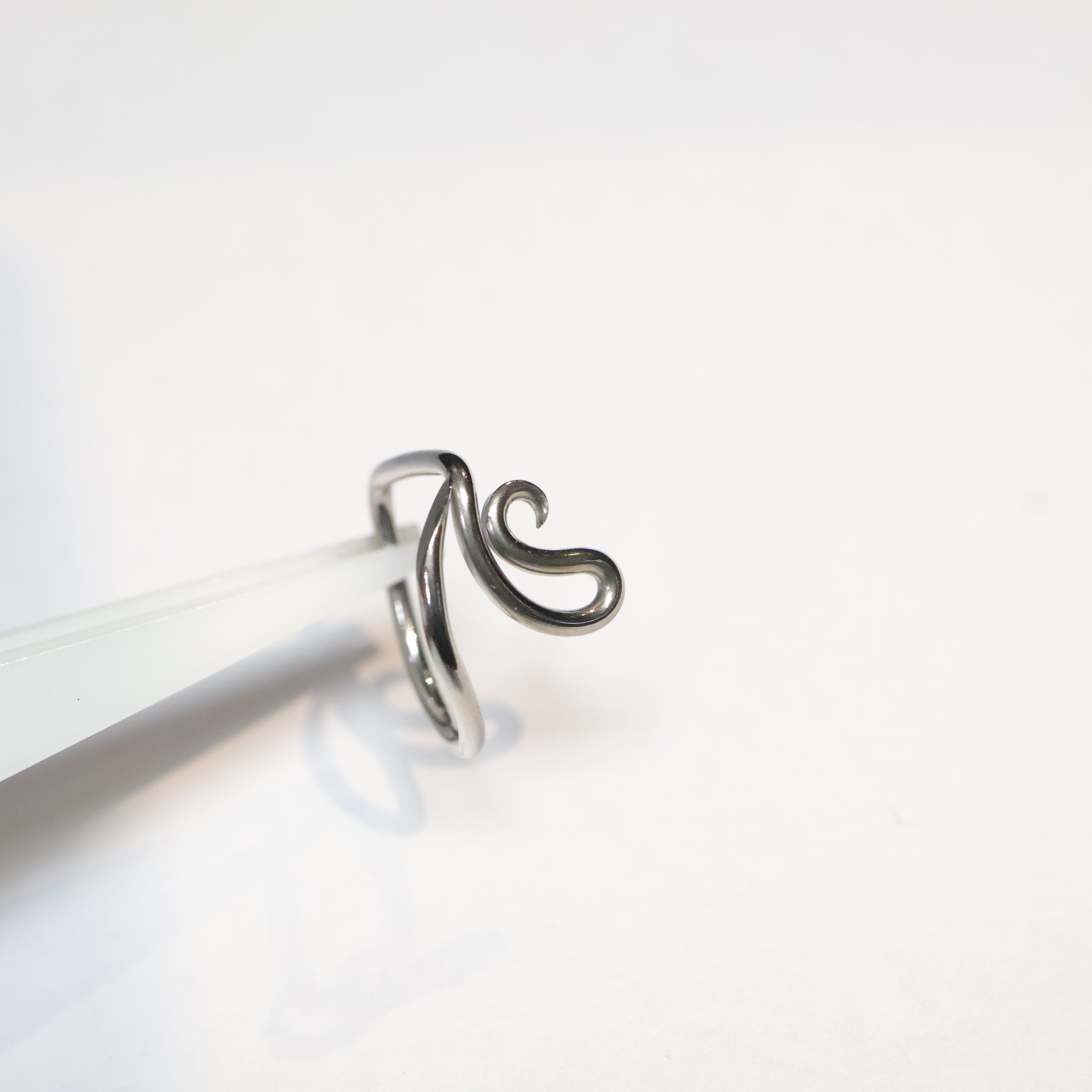 Capella	(Nostril, Tragus, & Forward Helix)