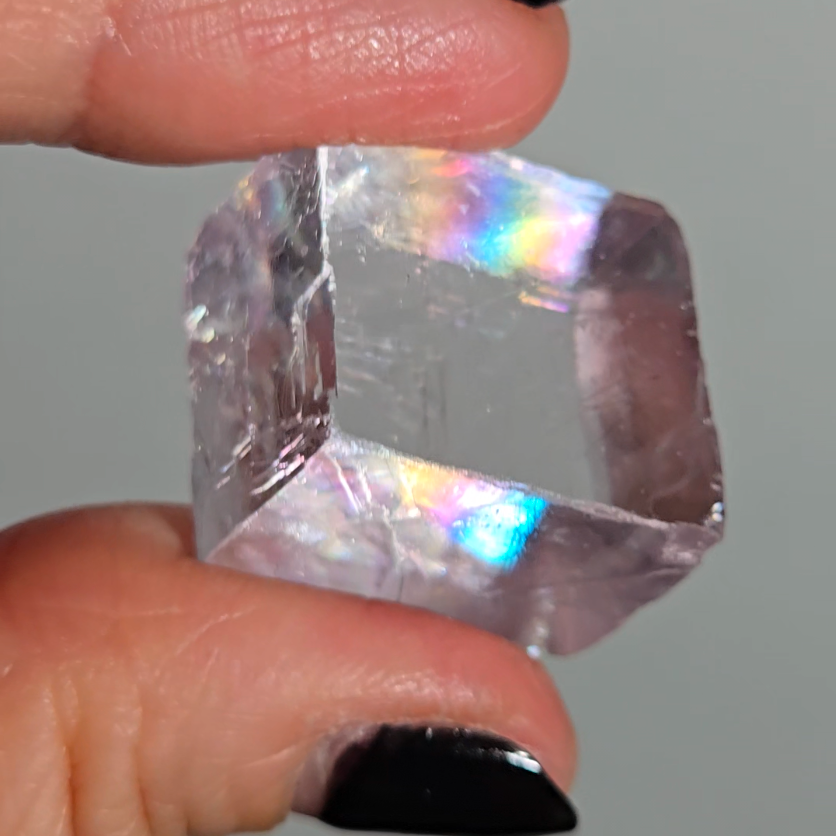 Purple calcite cube with rainbows - PC8