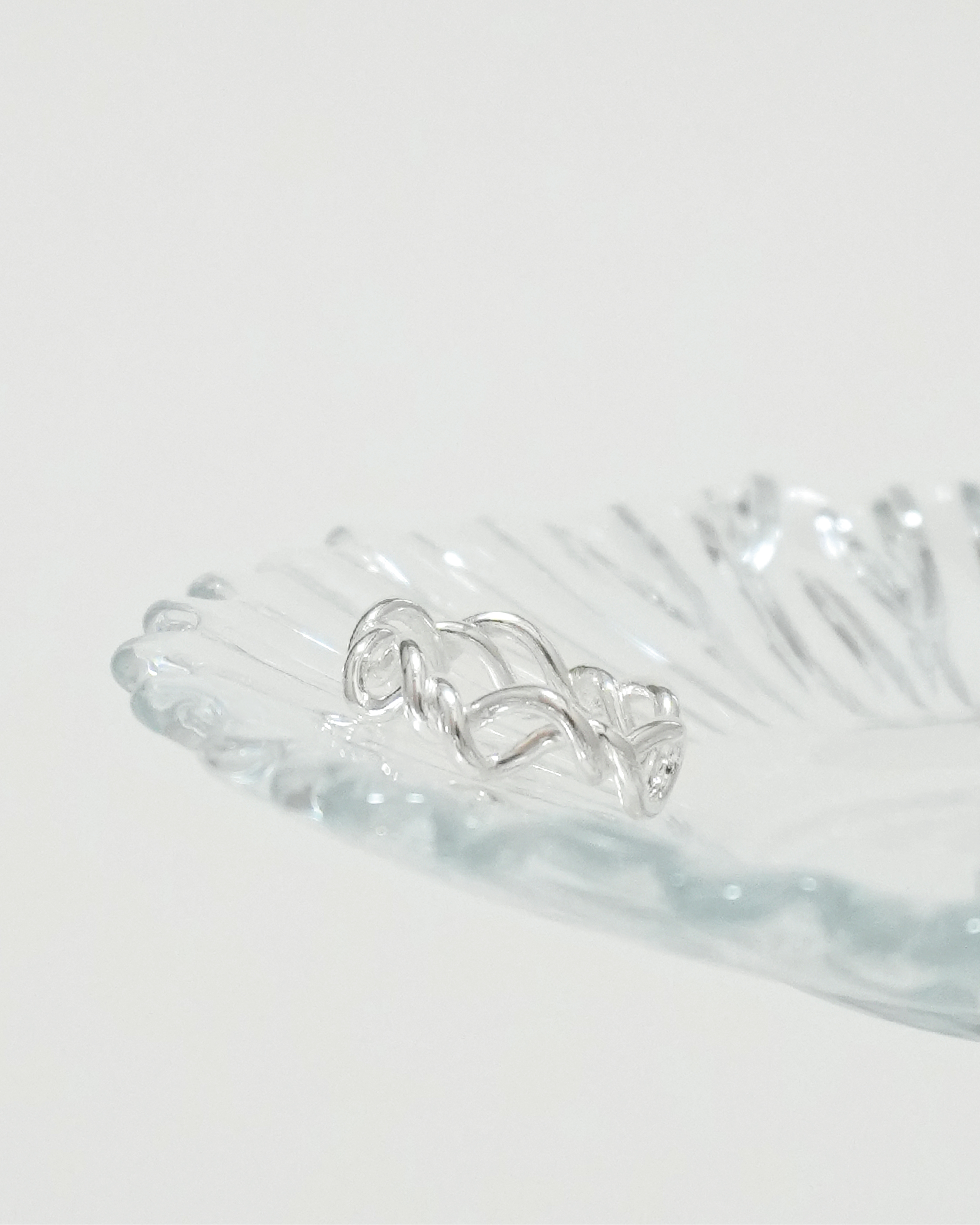 Fluid Margin Intertwined Ring