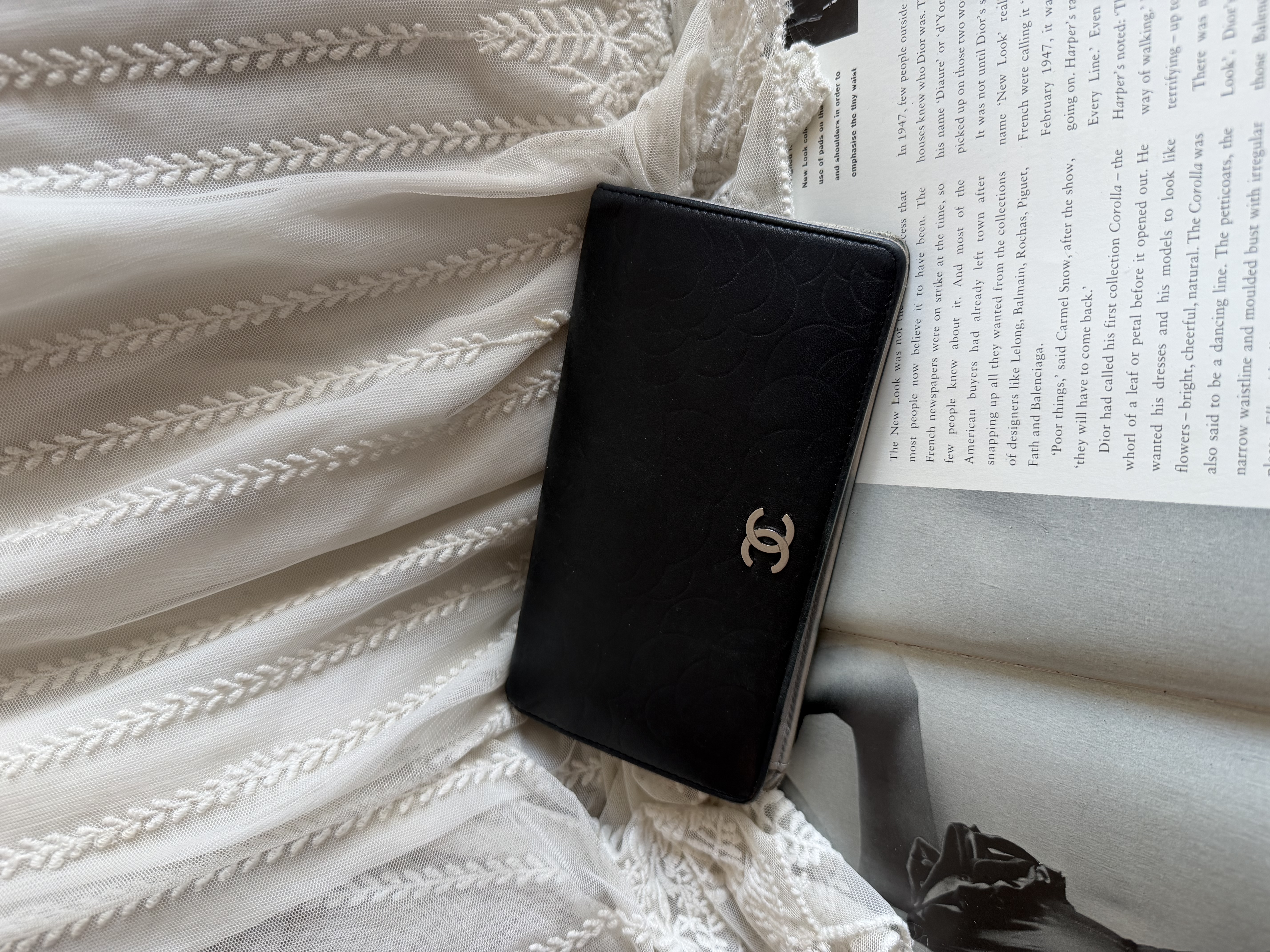 Chanel black leather camellia wallet