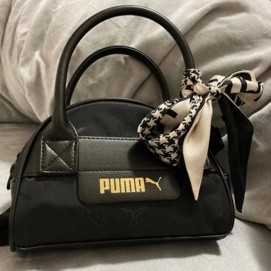 $75隻。2隻起$ 65隻。4色選擇Puma 隨行小包包