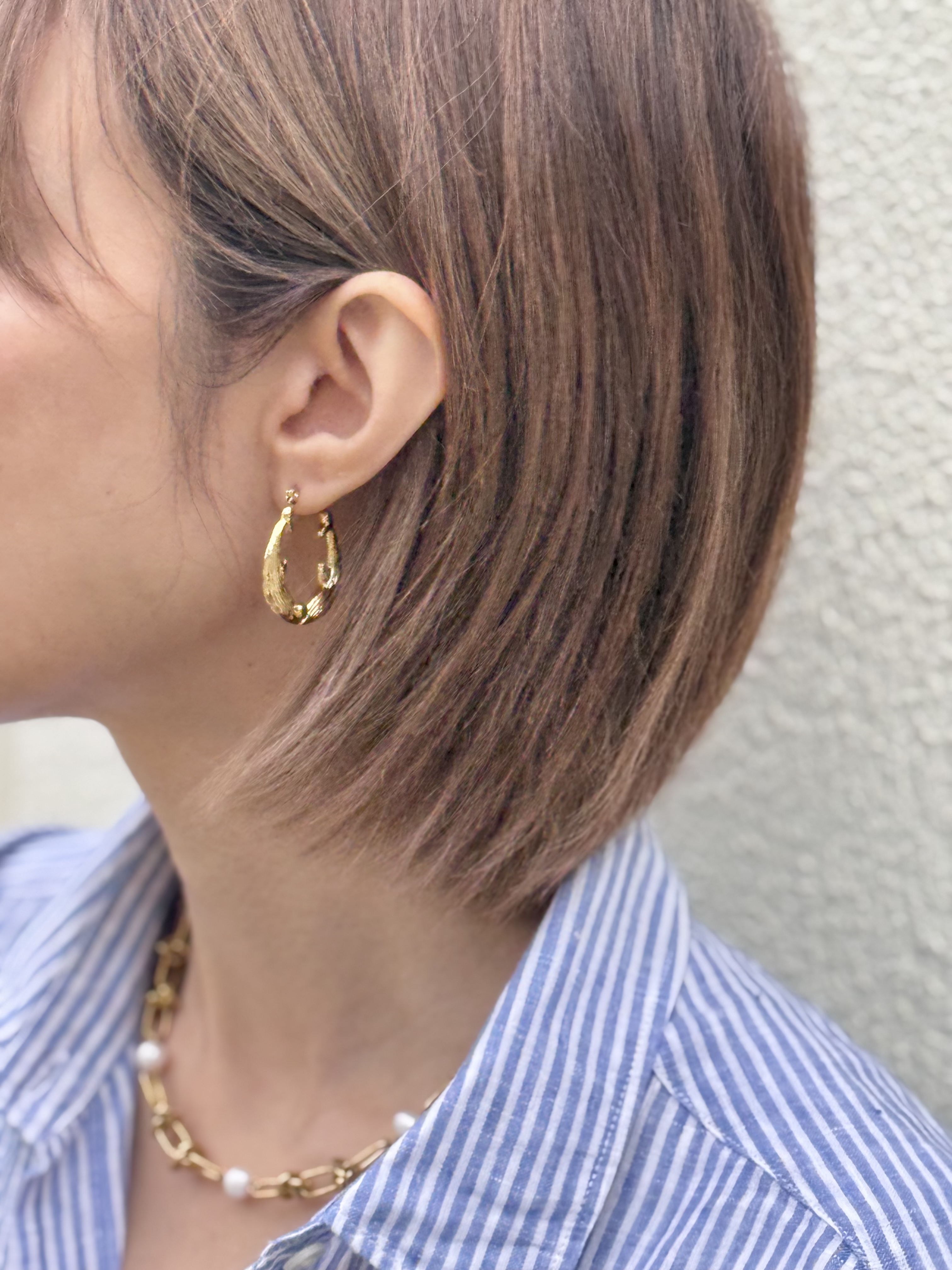 Gold dolphins stainless earring