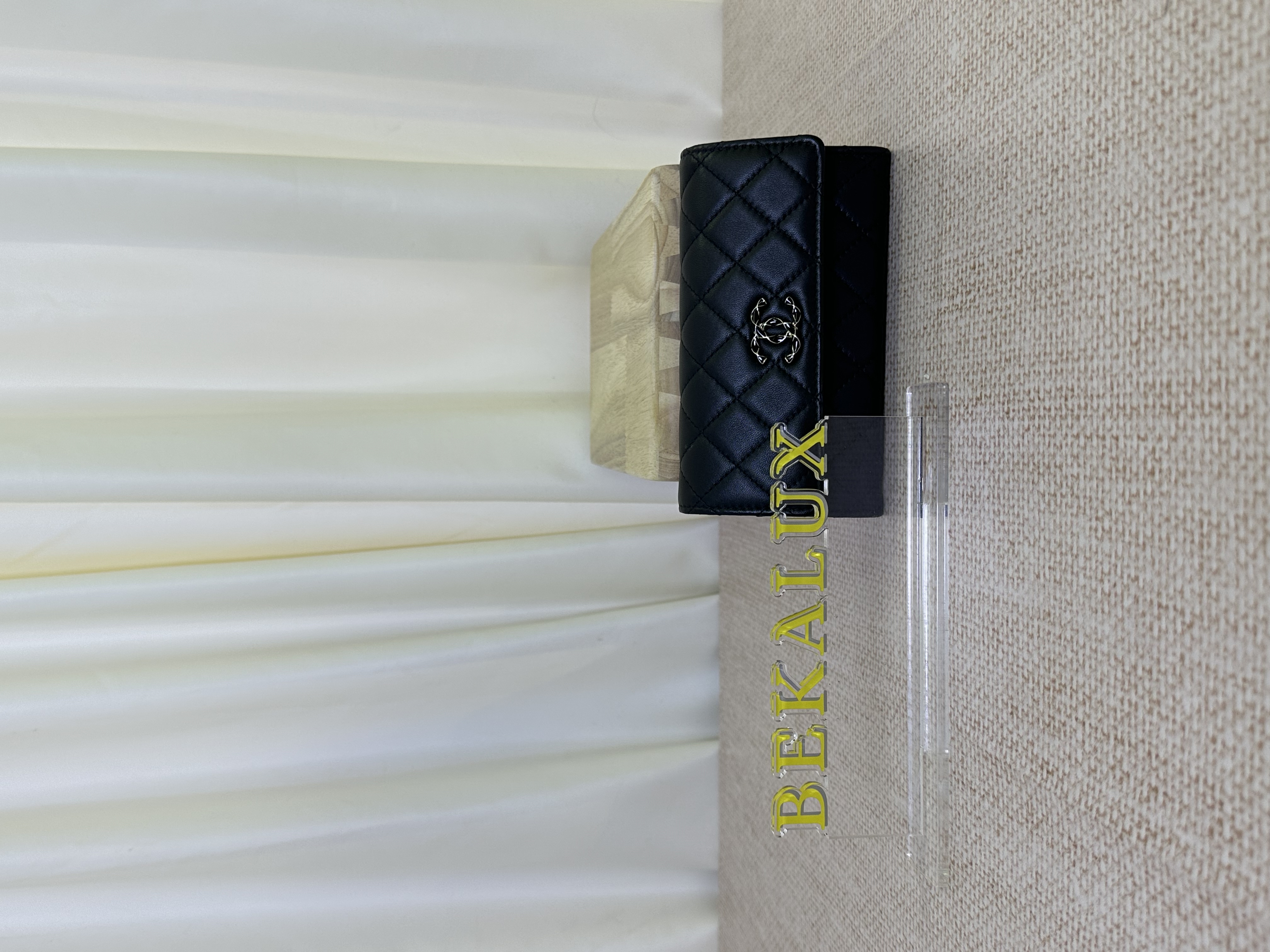 Pre owned Chanel black quilted flap wallet / Product Code: 26031024