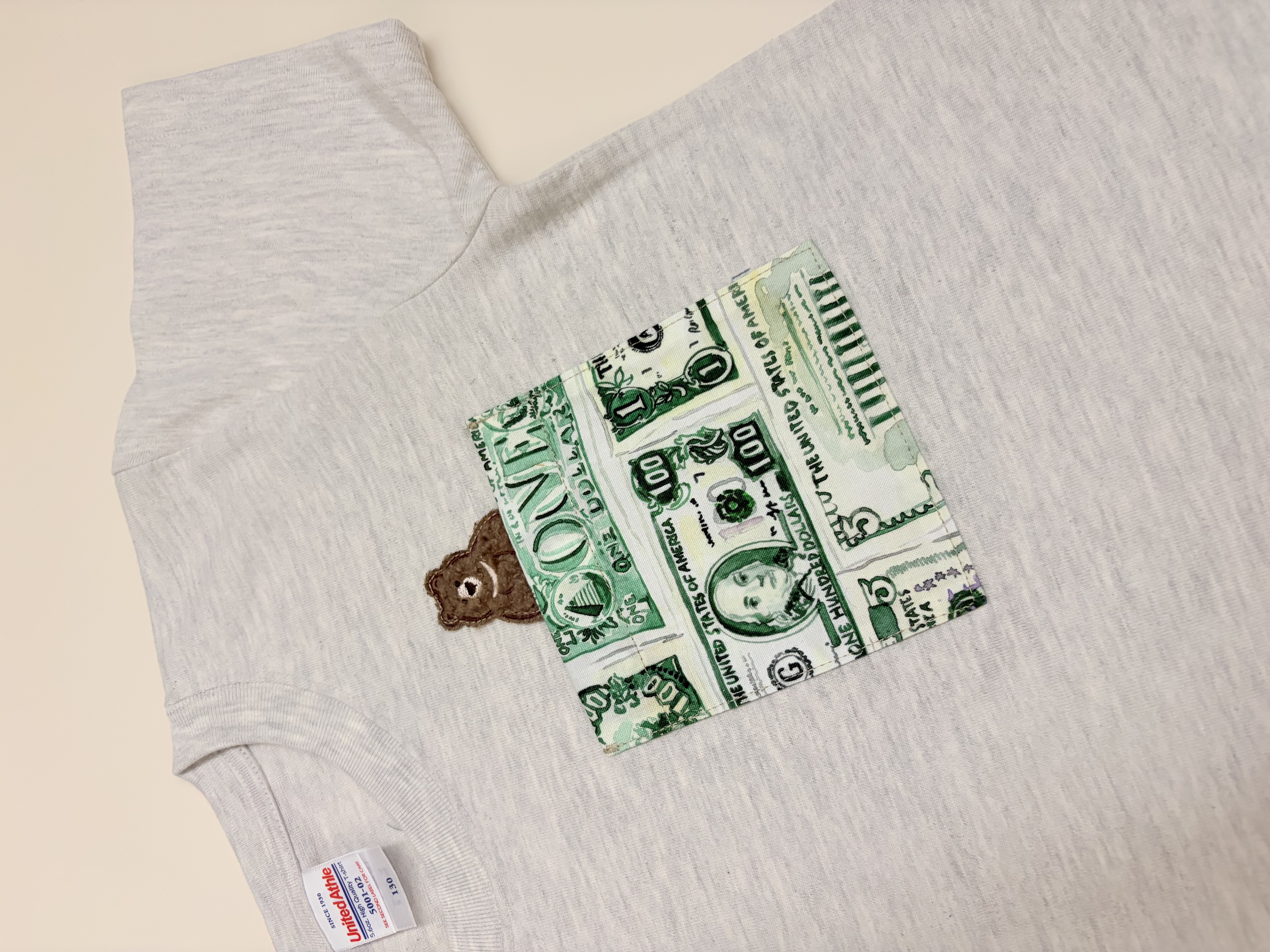 美元與小熊口袋T-Shirt（130碼）