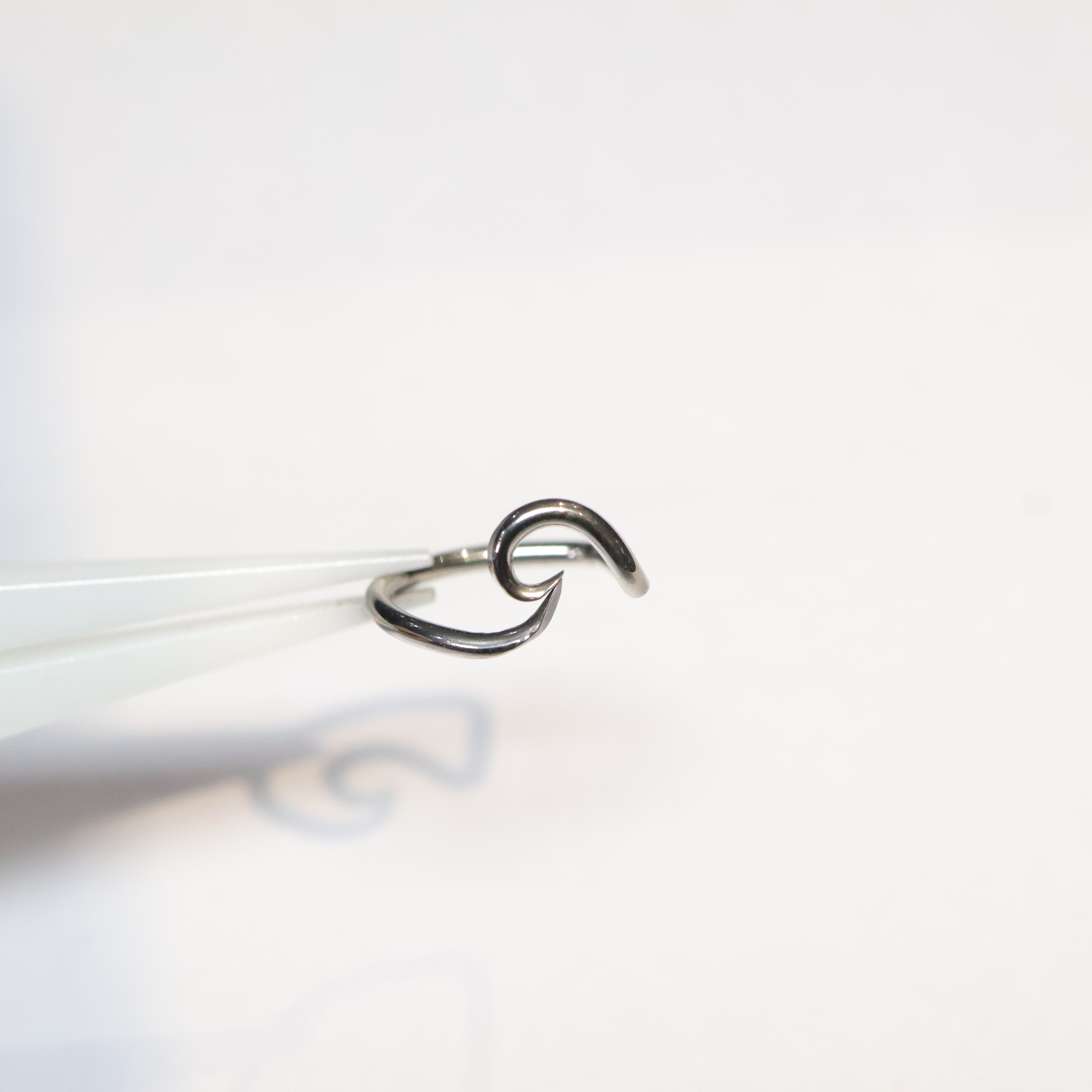 Vortex	(Nostril, Tragus, & Forward Helix)