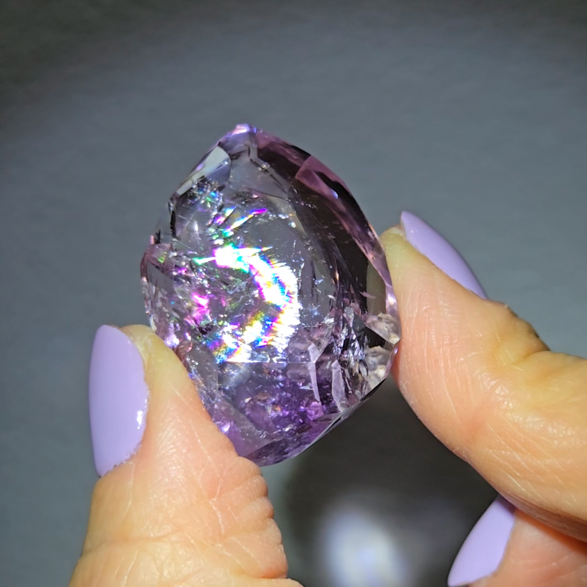 Amethyst pocket stone with rainbows - AM65
