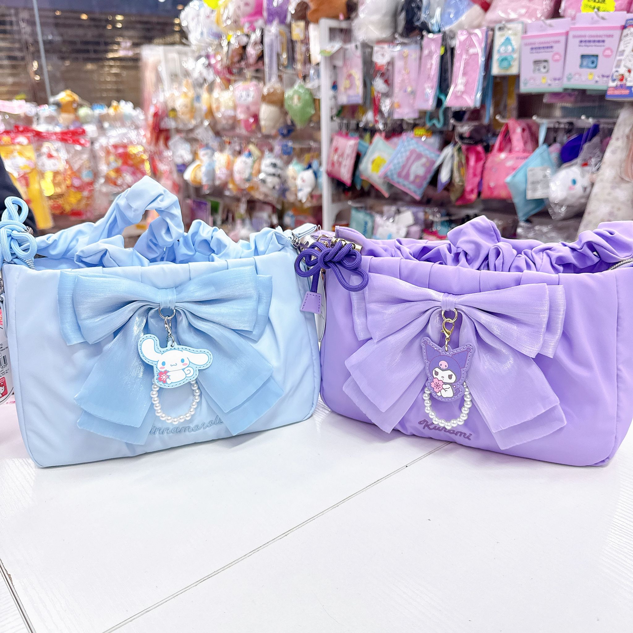 原裝行貨Sanrio Kuromi肉桂狗蝴蝶結斜孭袋 可以調校長做單肩包