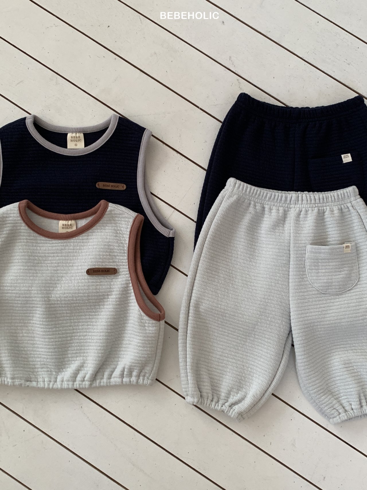 🌸預訂 韓國直送🌸🇰🇷BEBEHOLIC兩色皮革章撞色背心上下套裝