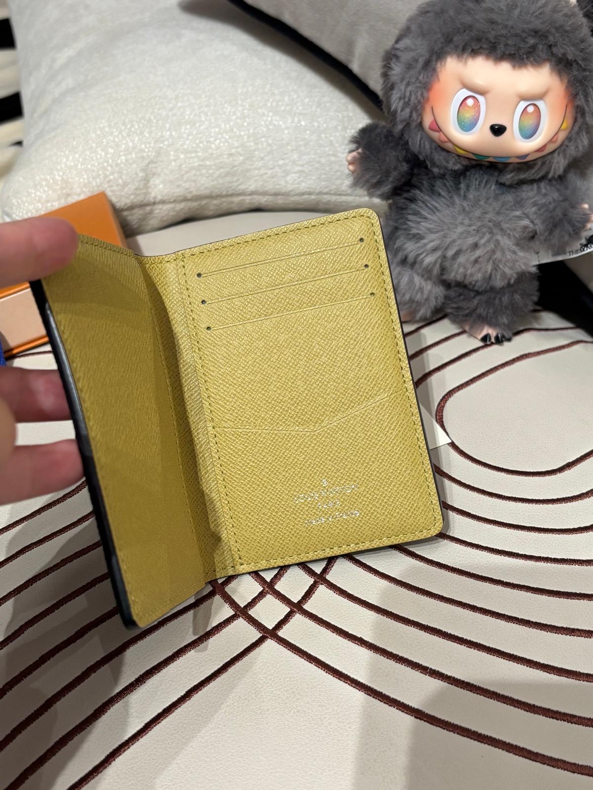 Lv pocket organizer 100%Authentic, 
