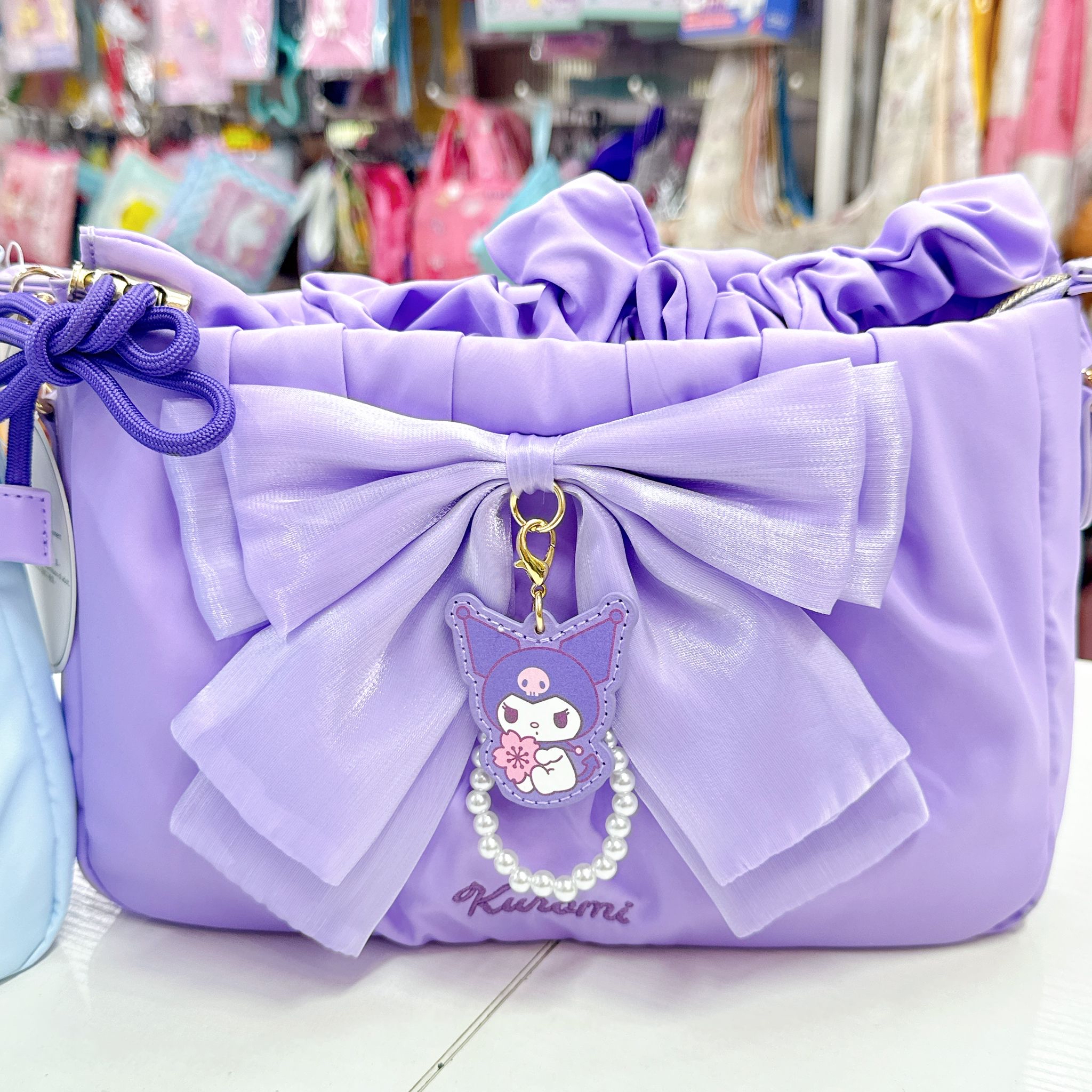 原裝行貨Sanrio Kuromi肉桂狗蝴蝶結斜孭袋 可以調校長做單肩包