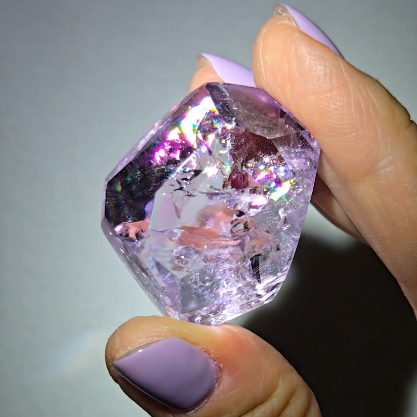 Amethyst pocket stone with rainbows and clarity - AM67
