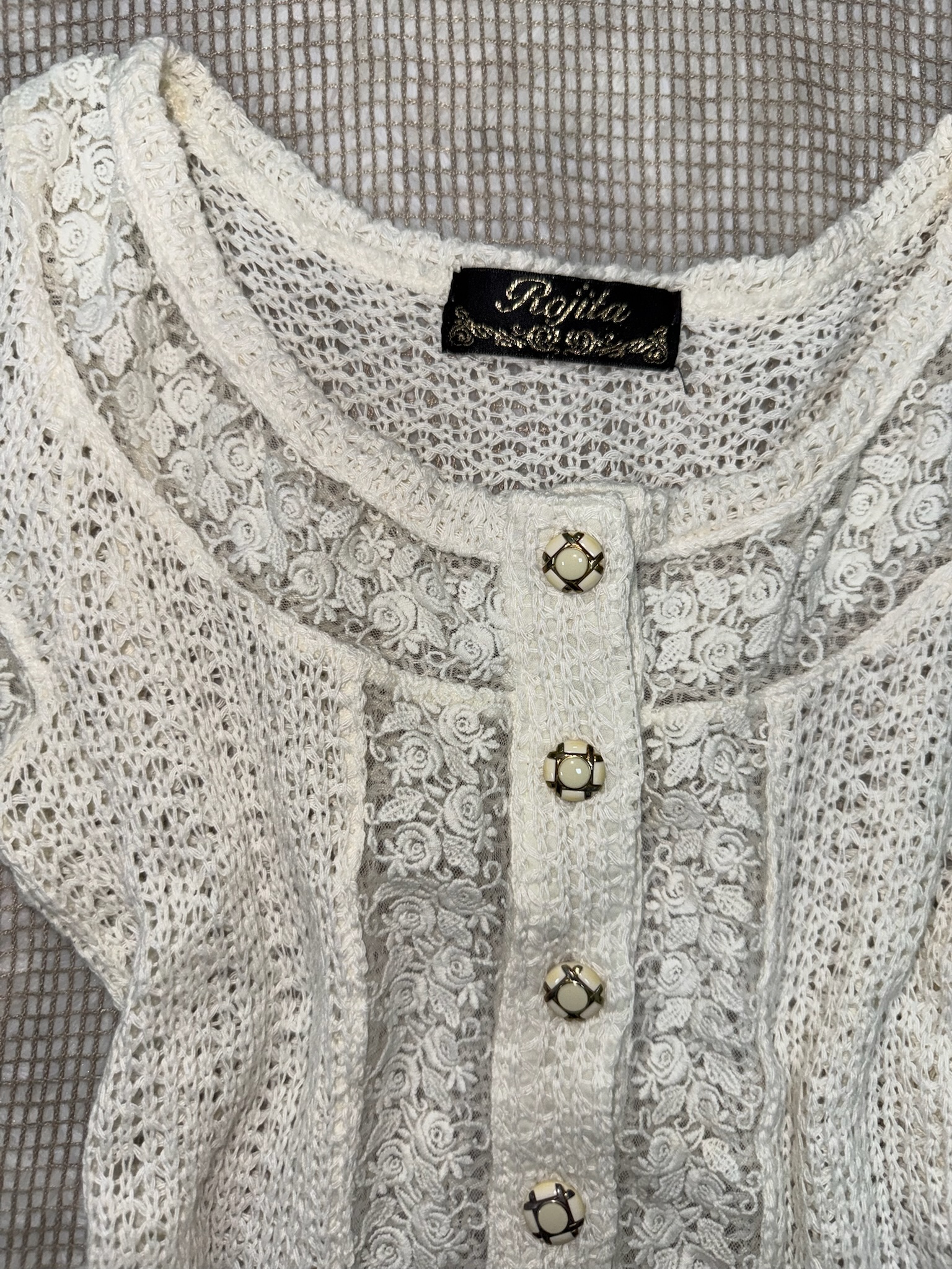 Cream Short-Sleeve Crochet Lace Blouse with Ornate Buttons and Floral Trim