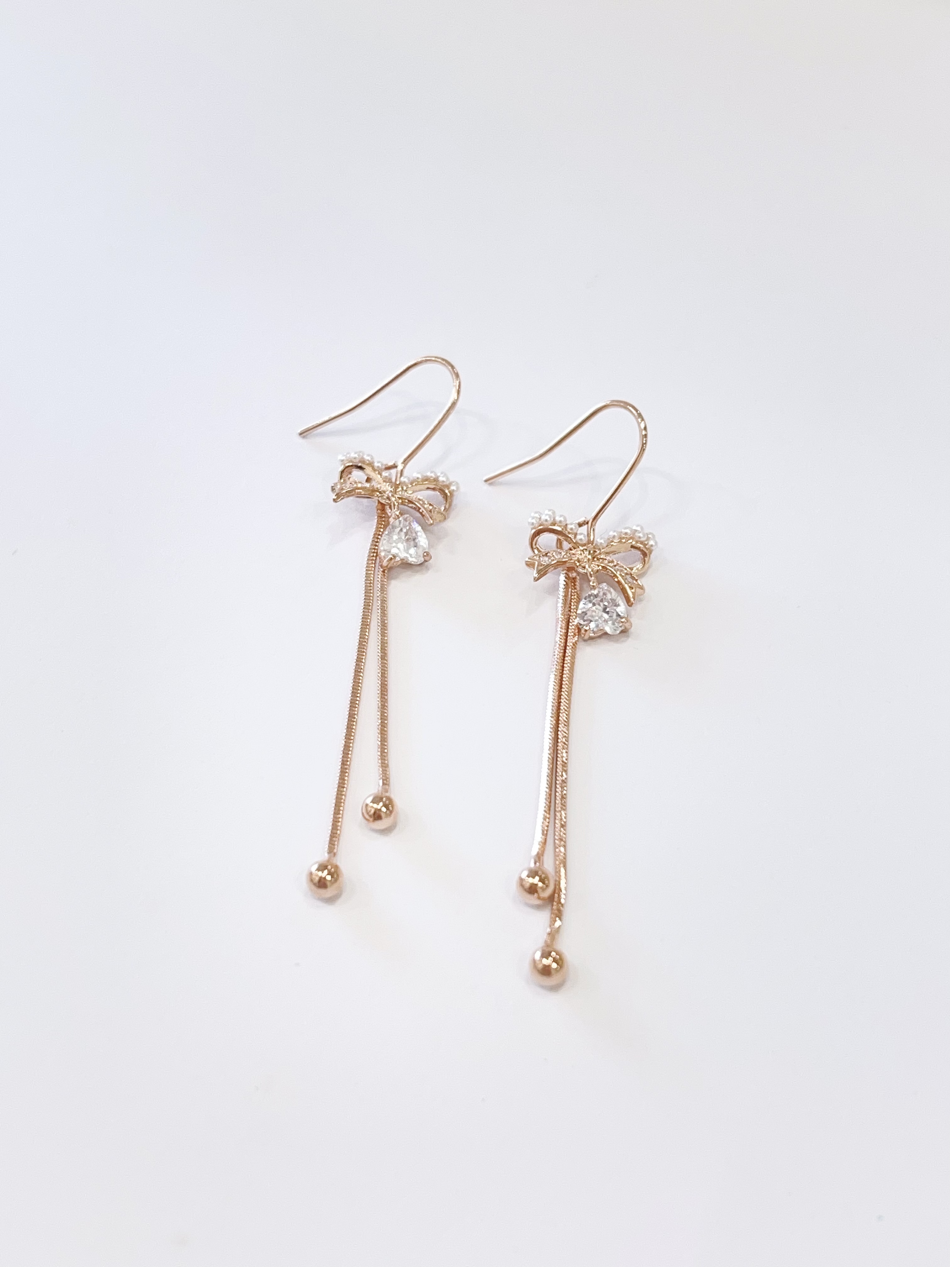 玫瑰金蝴蝶结双流苏耳环