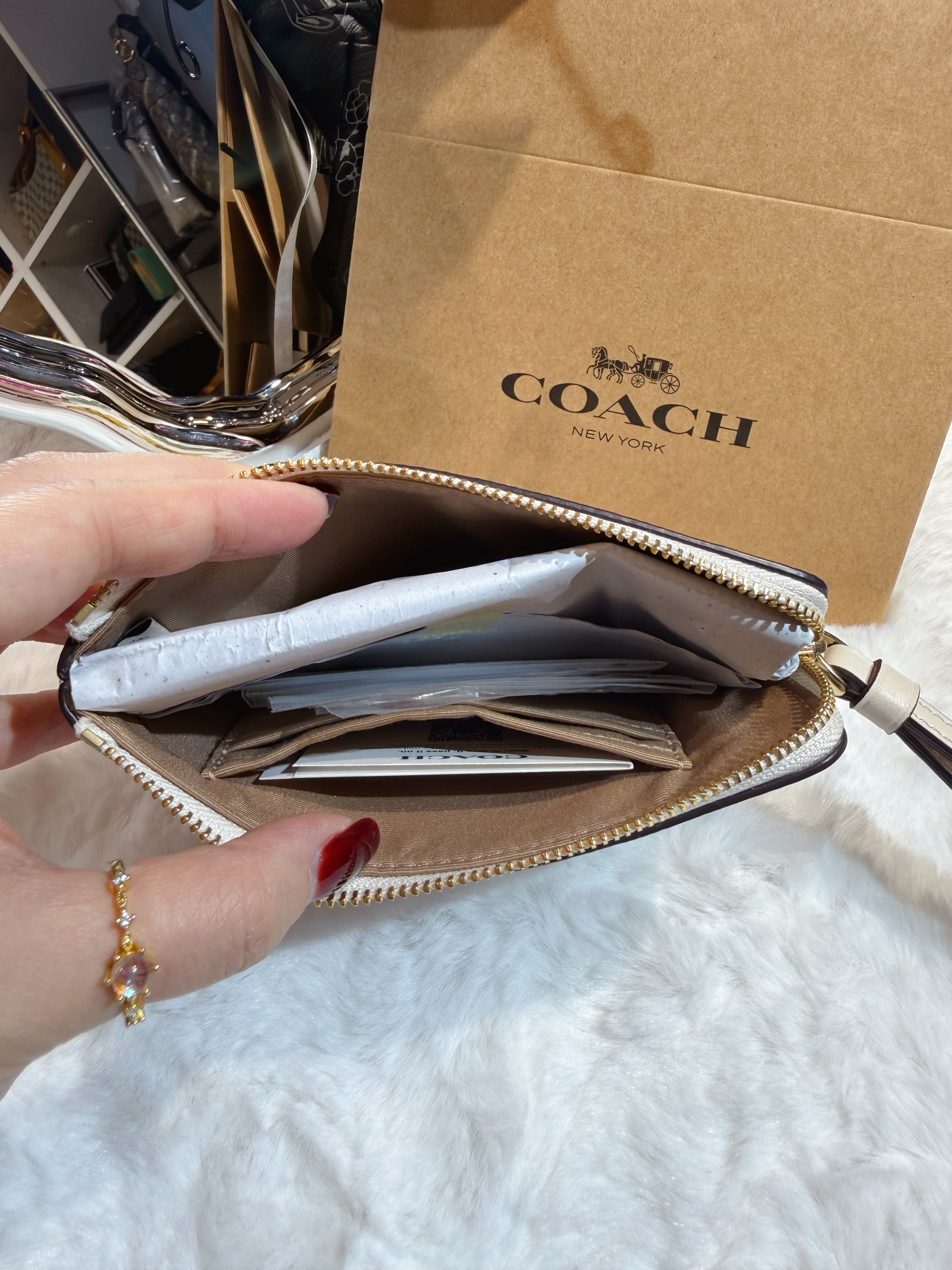 Coach wristlet w/butterfly