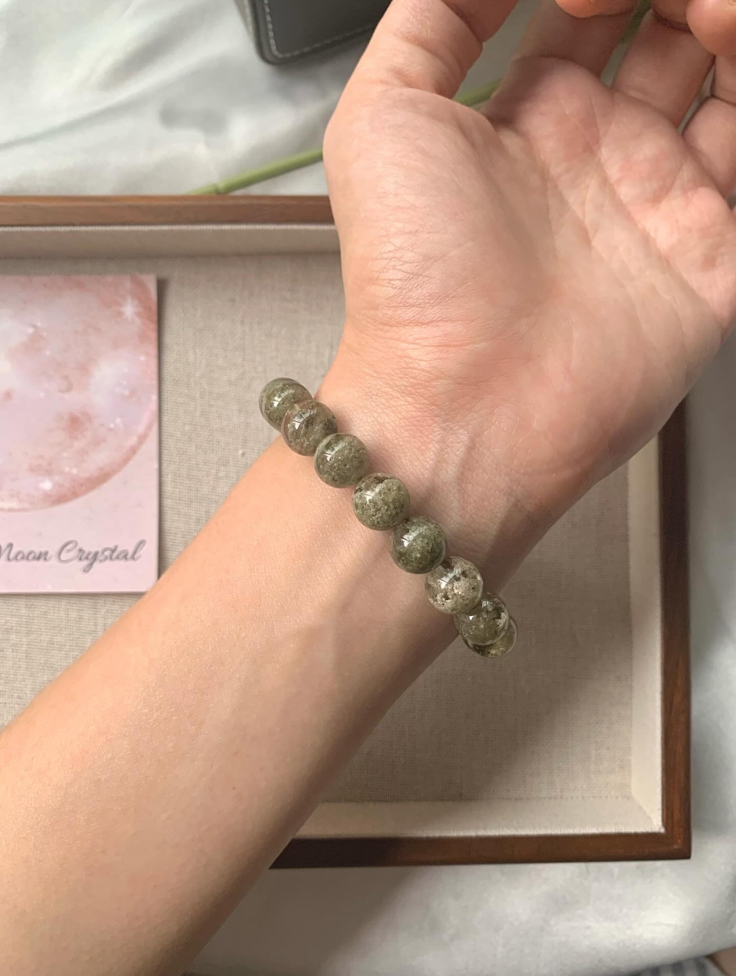 莫奈绿幽灵 ｜ Green Phantom 10.6mm RM398 (只有一条）绿幽灵主要功效包括招正财、助事业发展、平衡身心情绪，并且能够吸引贵人、增强人际关系，还具有辟邪和带来活力的作用Green phantom crystals are believed to offer various benefits, including promoting healing and balance on physical, emotional, and spiritual levels, enhancing spiritual growth and intuition, facilitating transformation and personal development by releasing old patterns, and amplifying energy for manifestation. They are also associated with attracting wealth and career opportunities, stimulating concentration and memory, and aiding in the successful completion of long-term projects. Some also claim it can purify the aura, align chakras, and protect against negative energies#绿幽灵 #greenphantom #naturestone #gemstone #天然水晶 #水晶手串 #马来西亚水晶网店