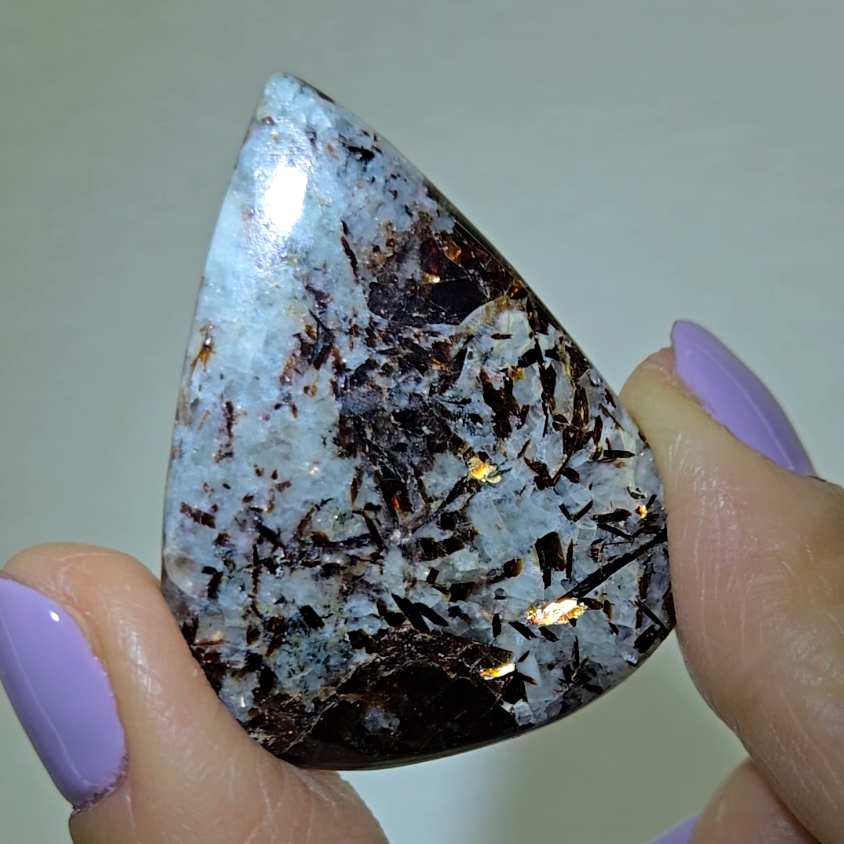Astrophyllite cabochon with flashy golden flakes - AST21