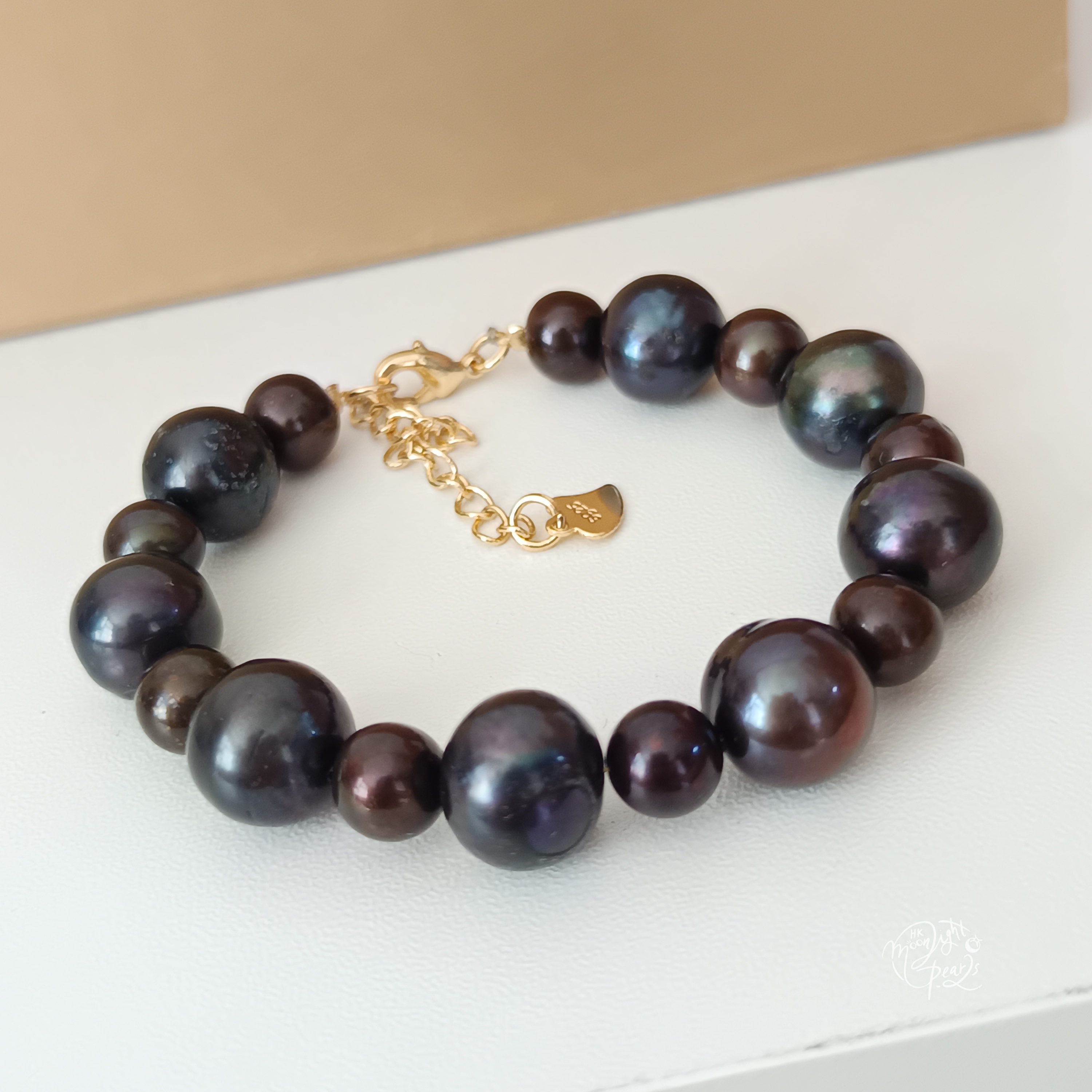 特價品‼️近正圓強光淡水優化黑+啡色珍珠注金尾鍊扣手鍊