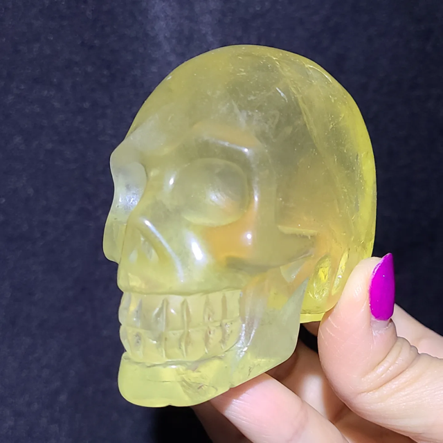 Citrine skull with rainbows.