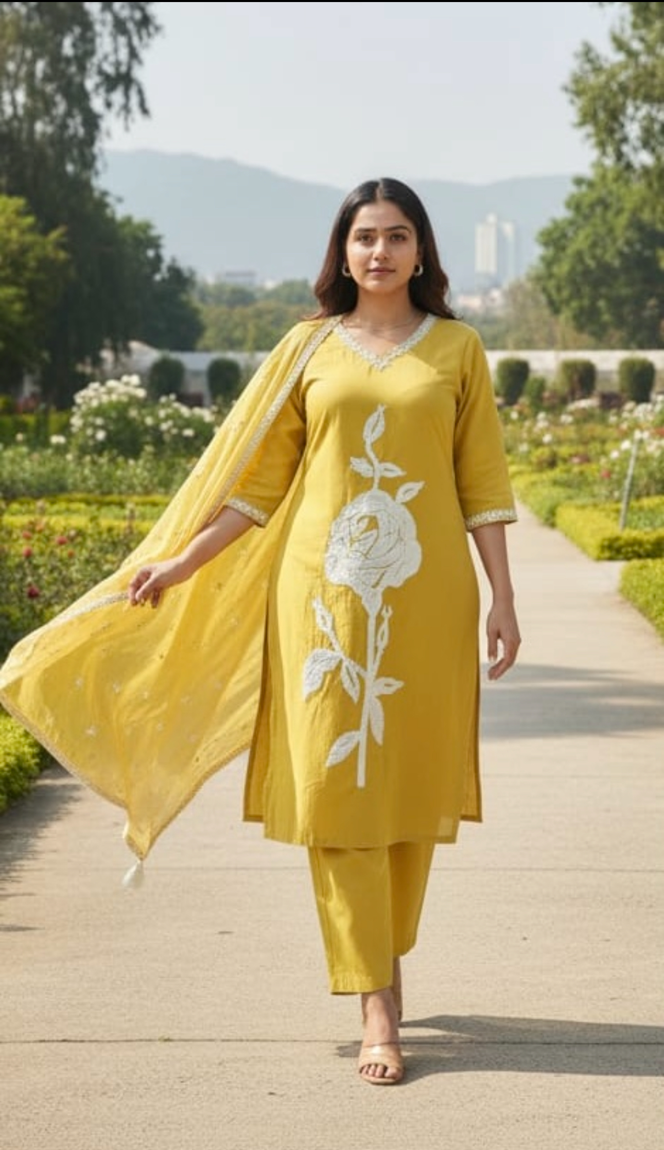 Yellow Kurta set with White embroidered flower