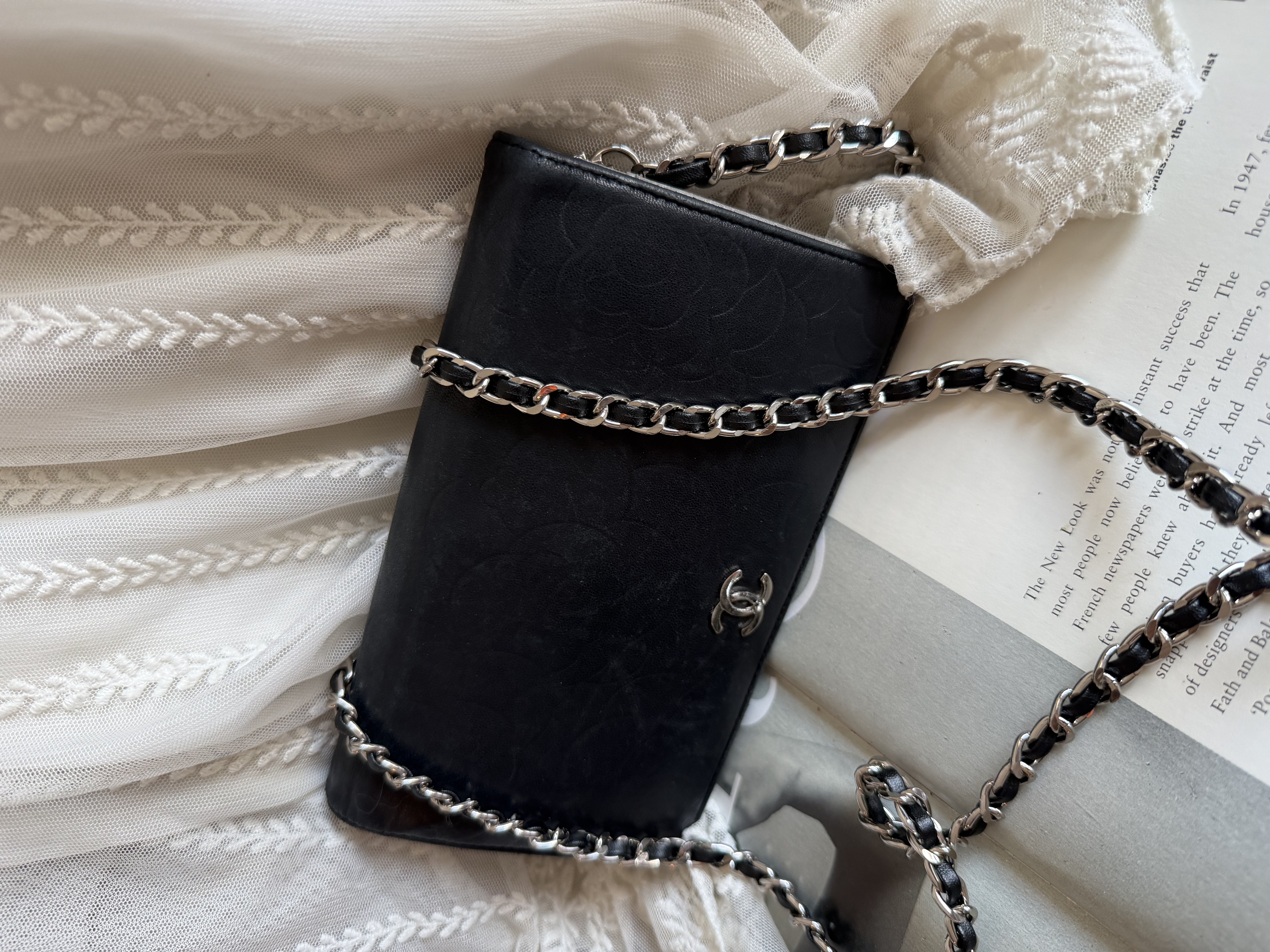 Chanel black leather camellia wallet