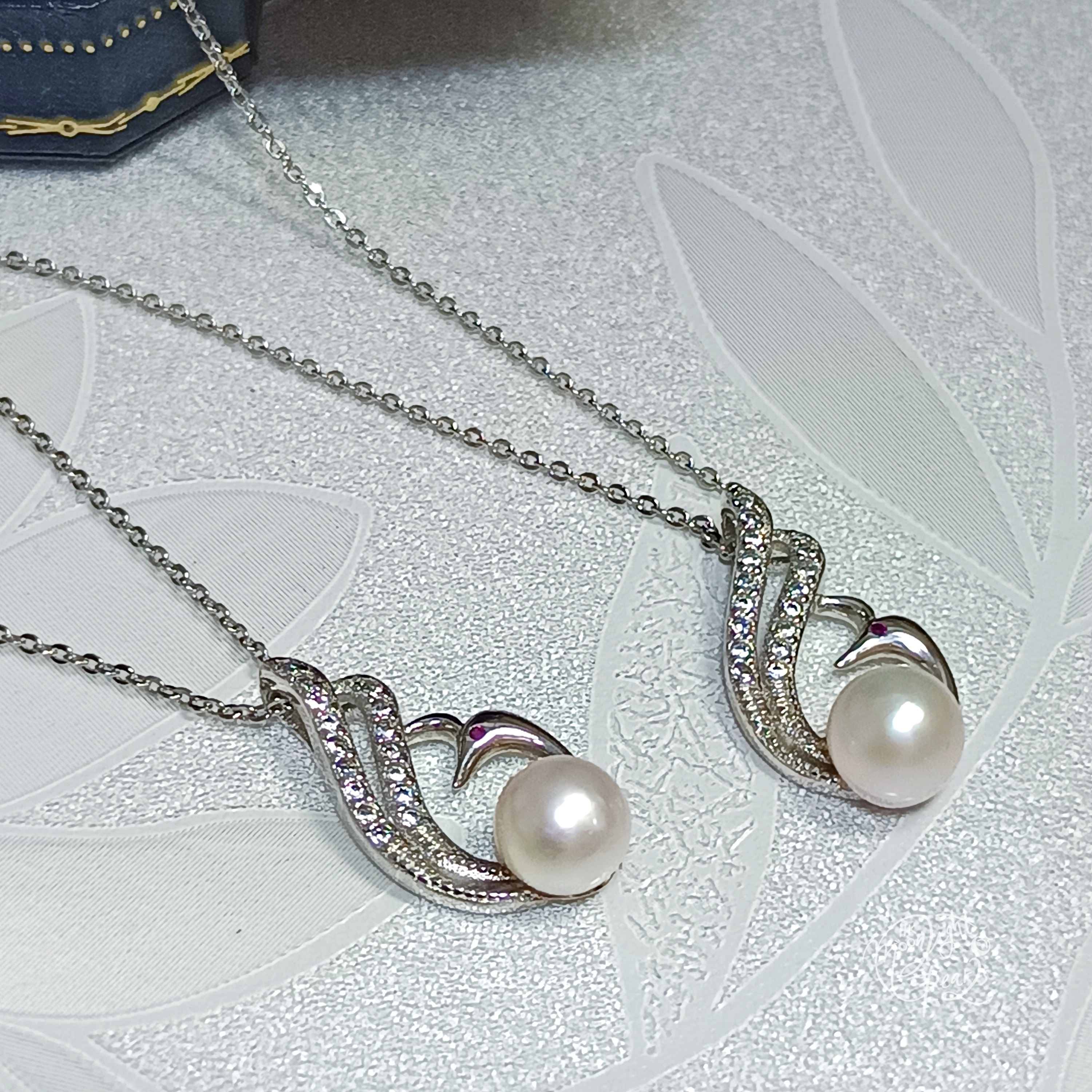 近正圓強光日本akoya 櫻花粉海水珍珠s925銀鳳凰吊墜（送注白金鍊）