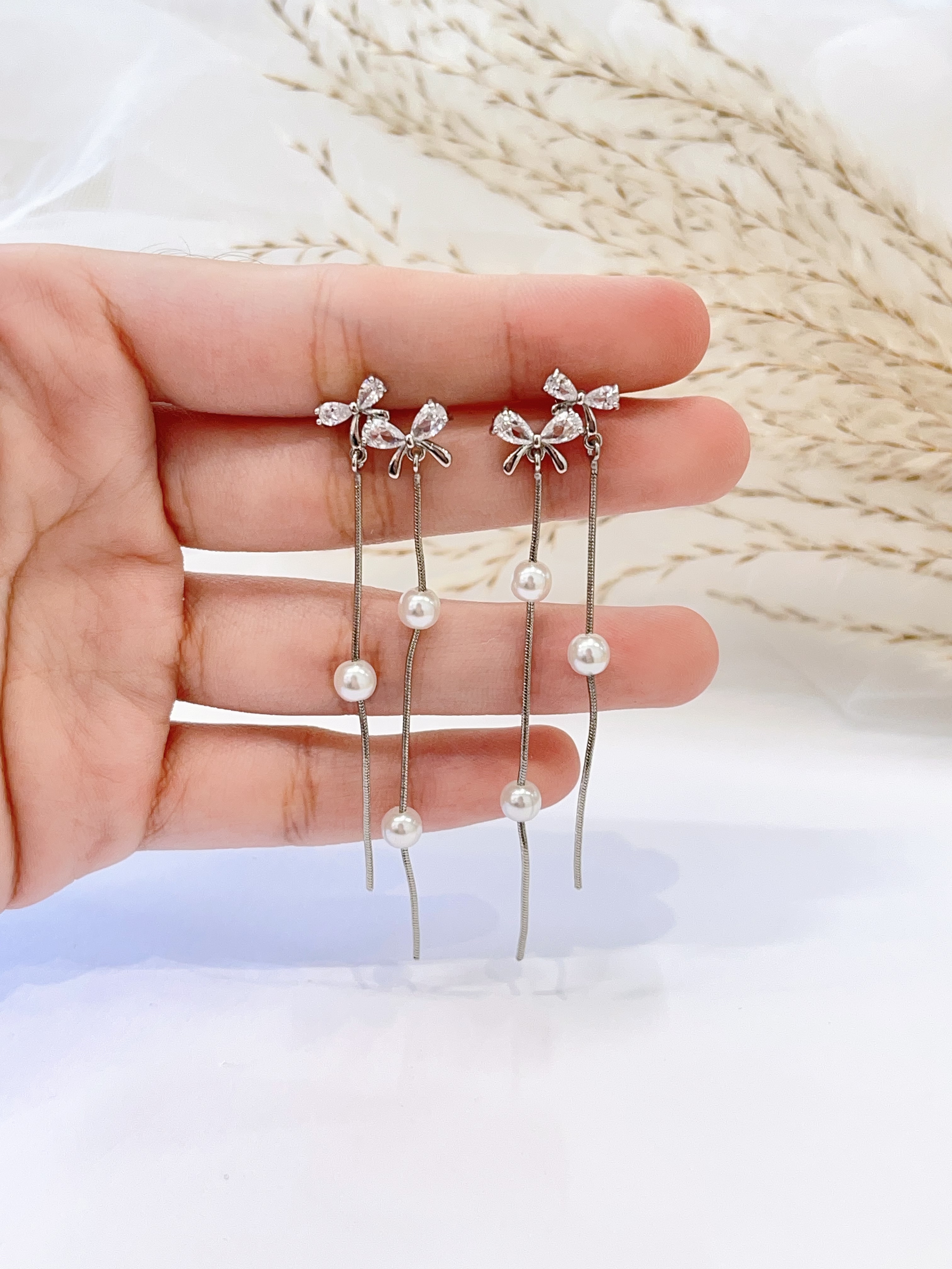 温柔风双蝴蝶结珍珠流苏耳环