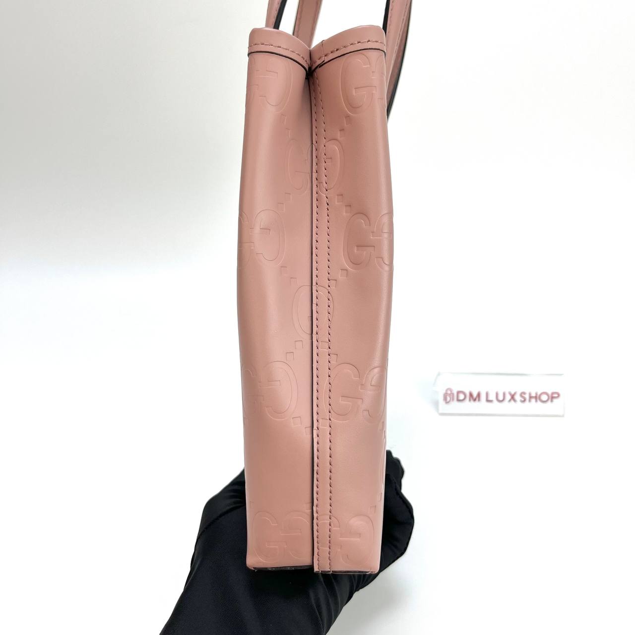 Gucci Pink GG Embossed Vertical Mini Tote