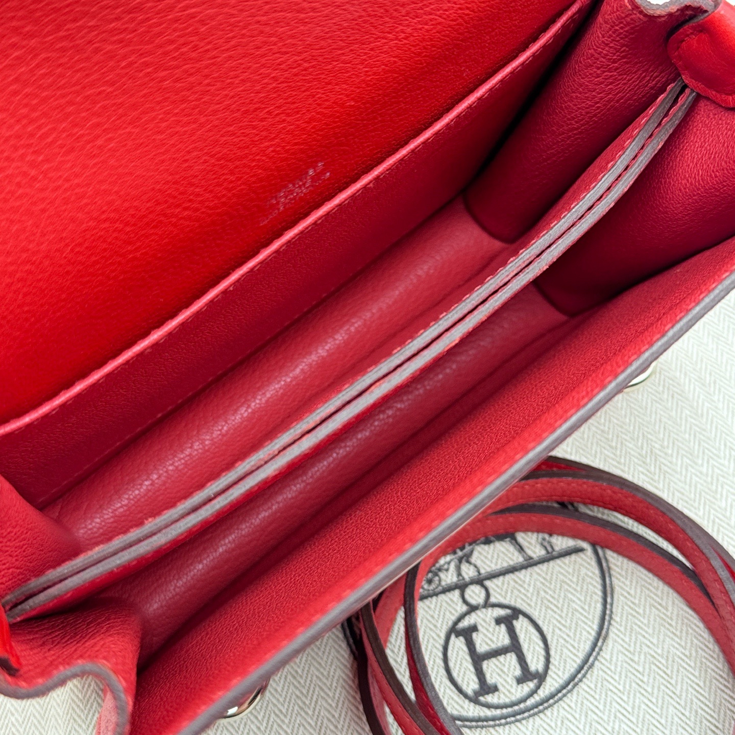Pre owned hermes roulis mini stamp X/ Y08211