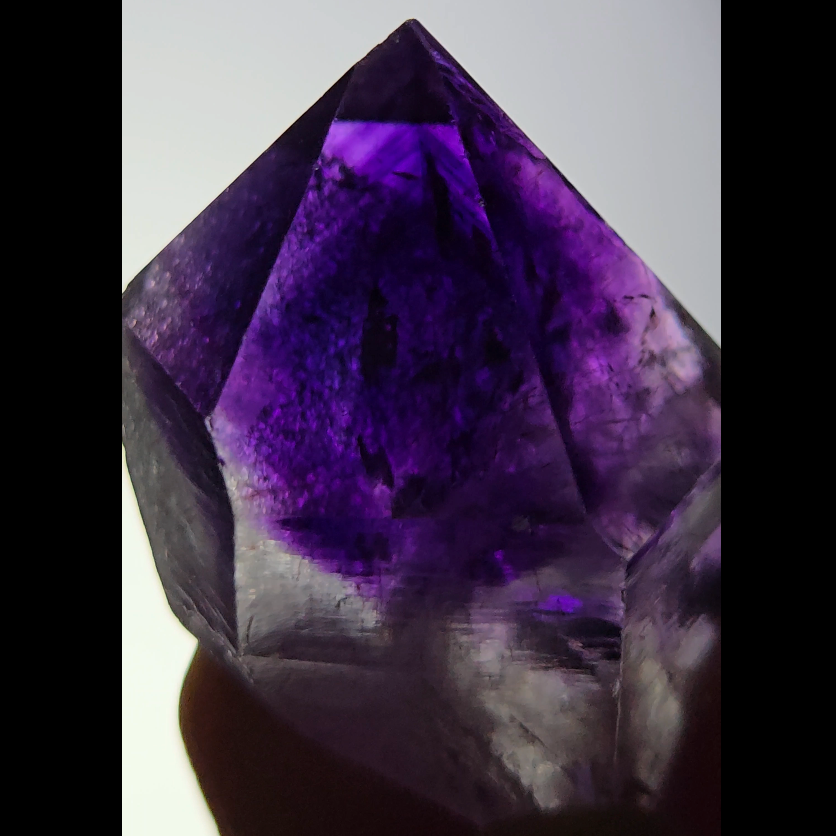 Blue amethyst point with phantom pyramid inclusions - AM143
