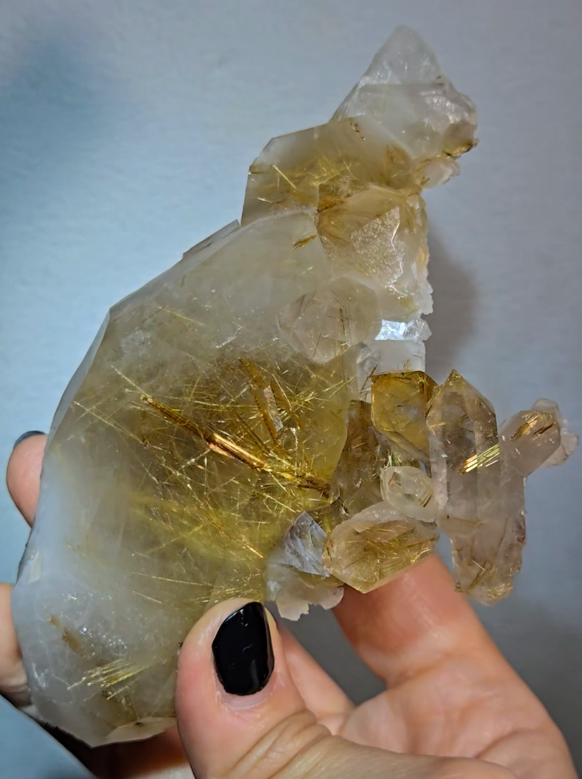 Golden titanium rutiles on black hematite in quartz cluster - RT1443