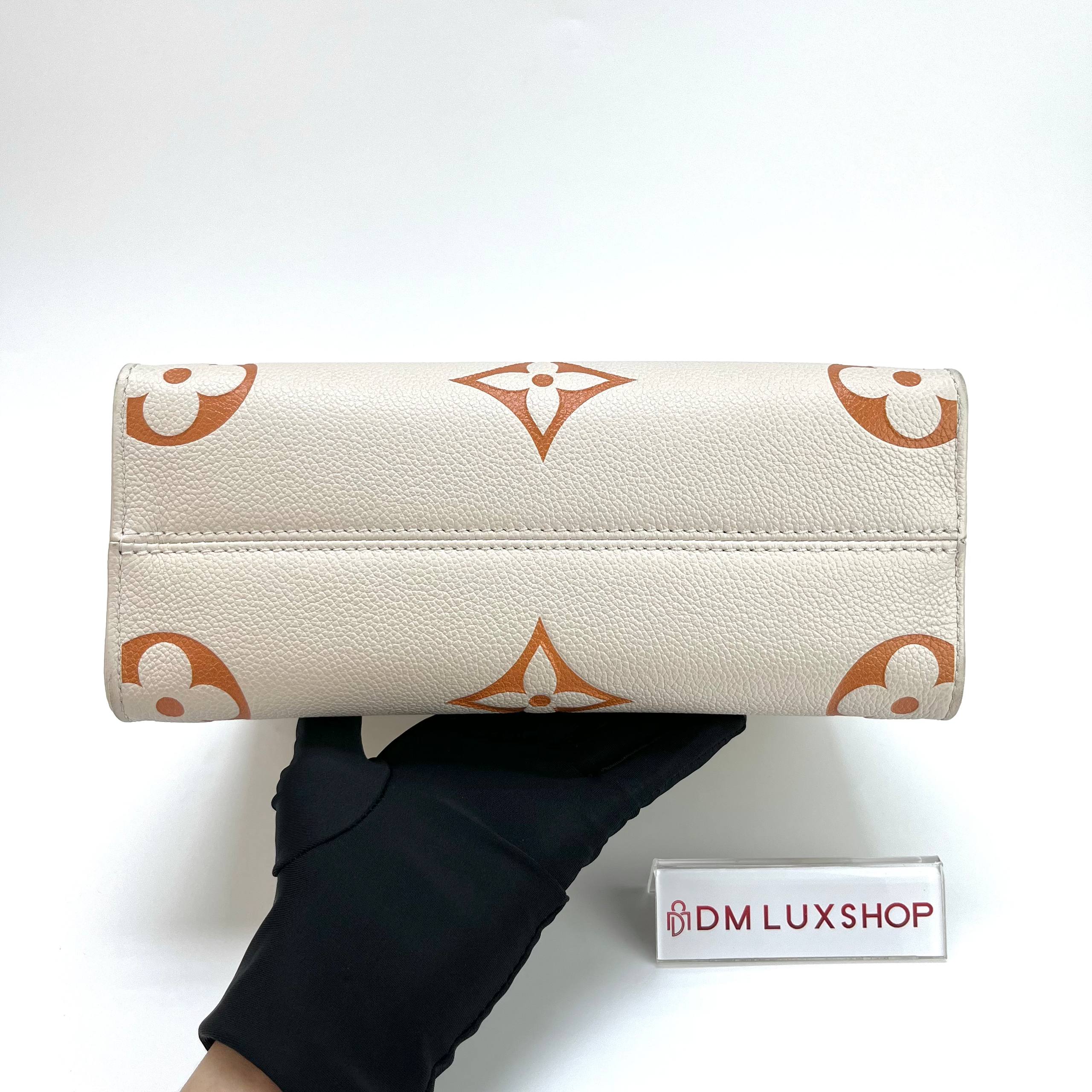 LV OnTheGo Beige Monogram Empreinte PM GHW