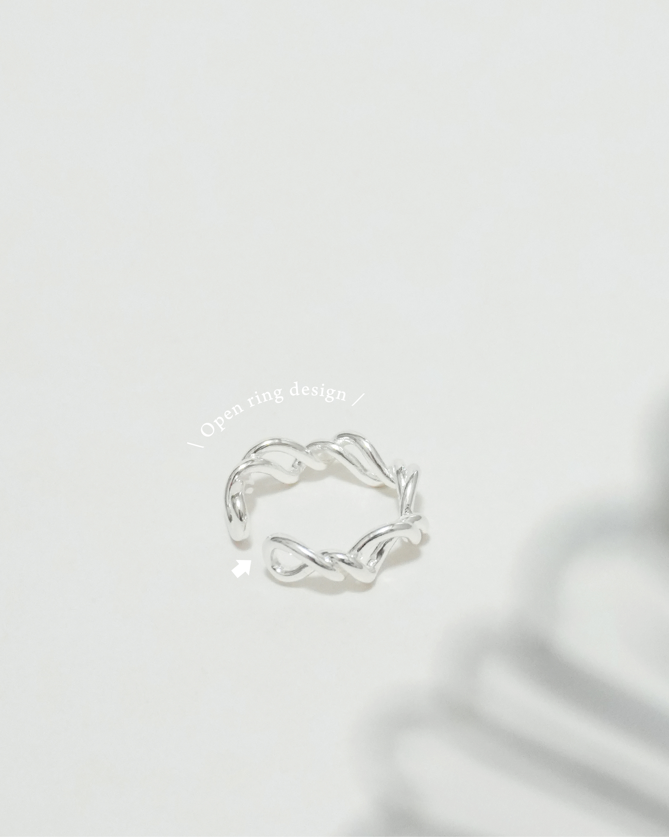 Fluid Margin Intertwined Ring
