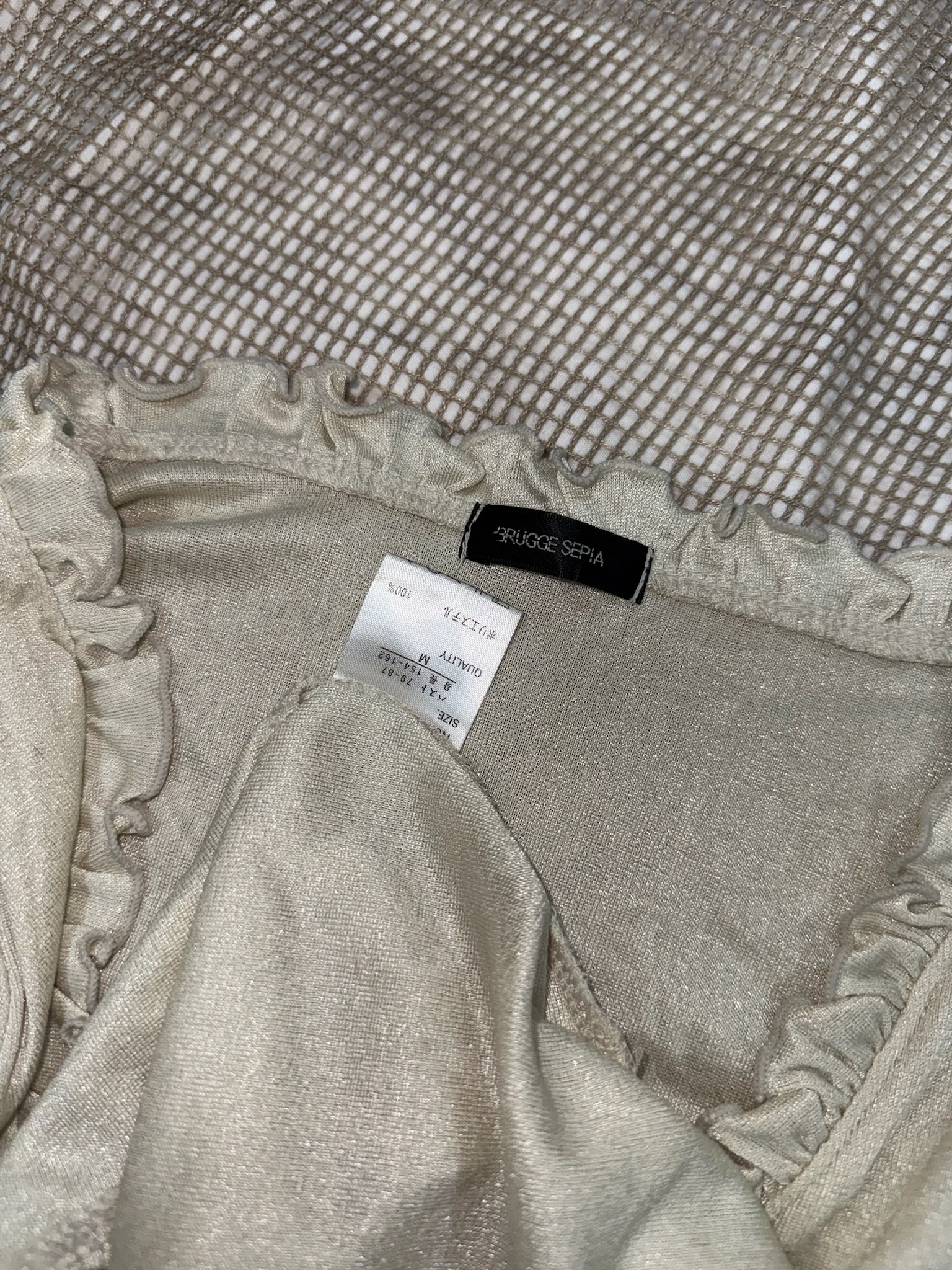 Soft Cream Ruffle-Hem Bolero Cardigan