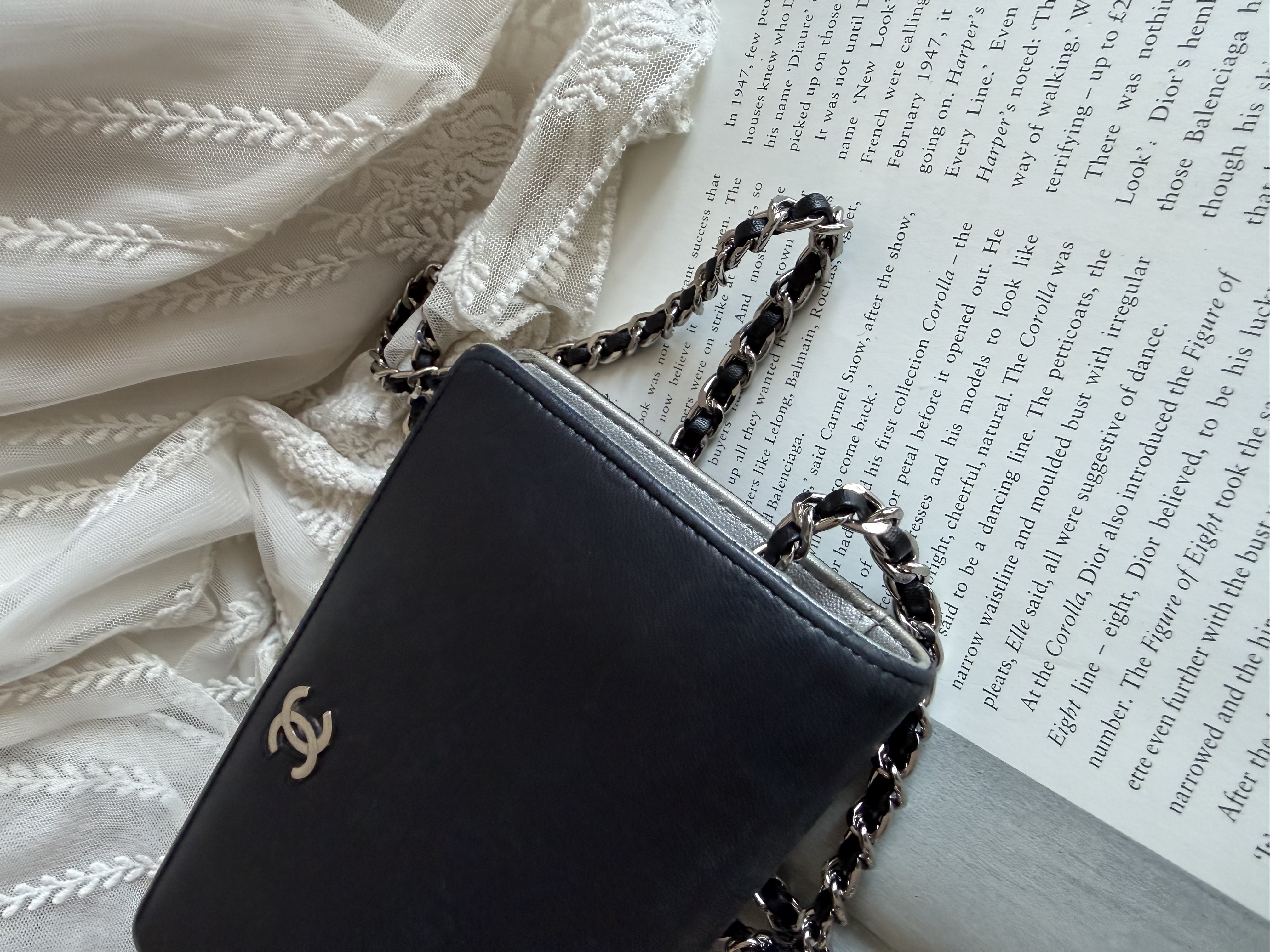 Chanel black leather camellia wallet