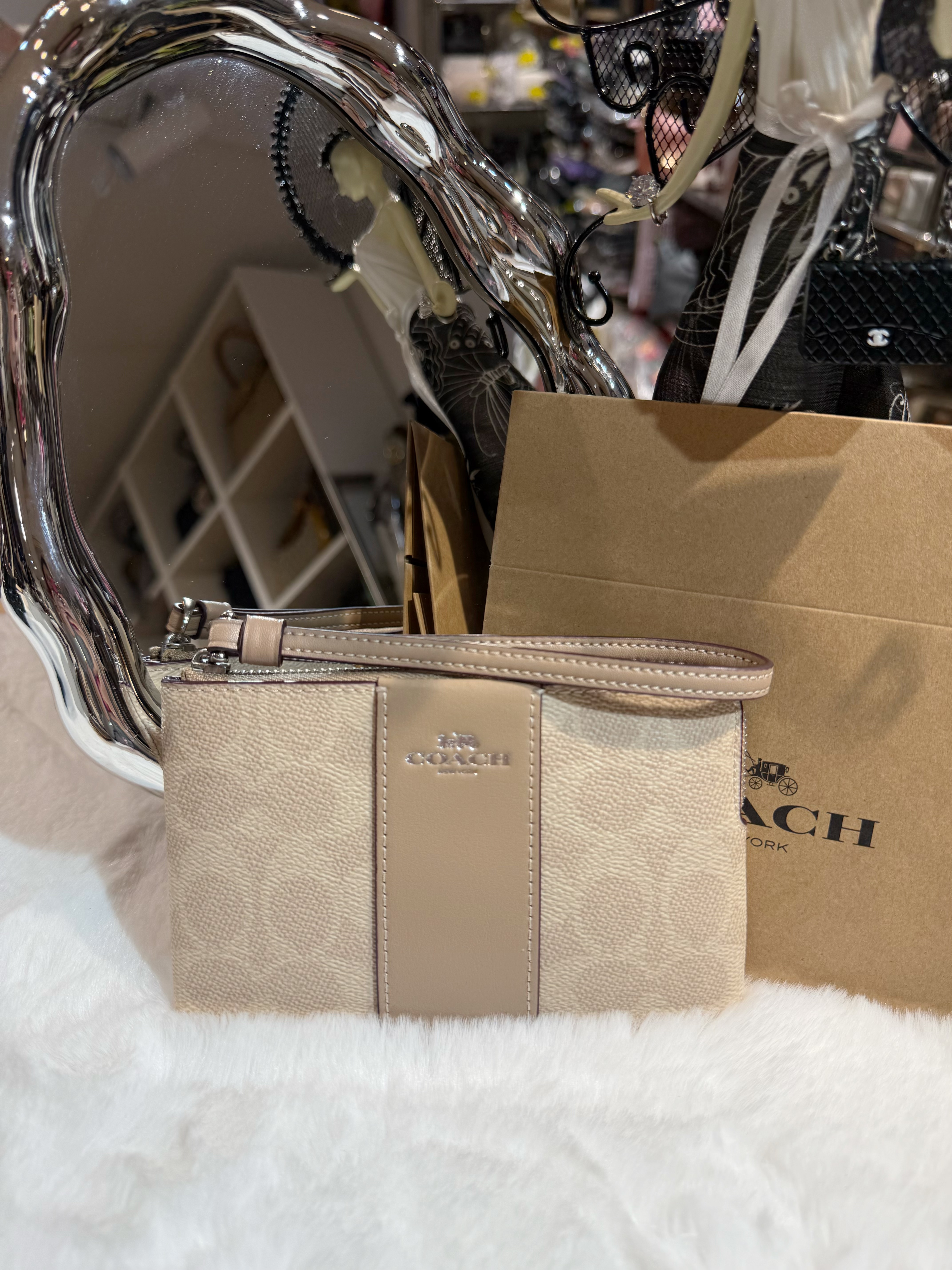 Coach wristlet  milk tea/m